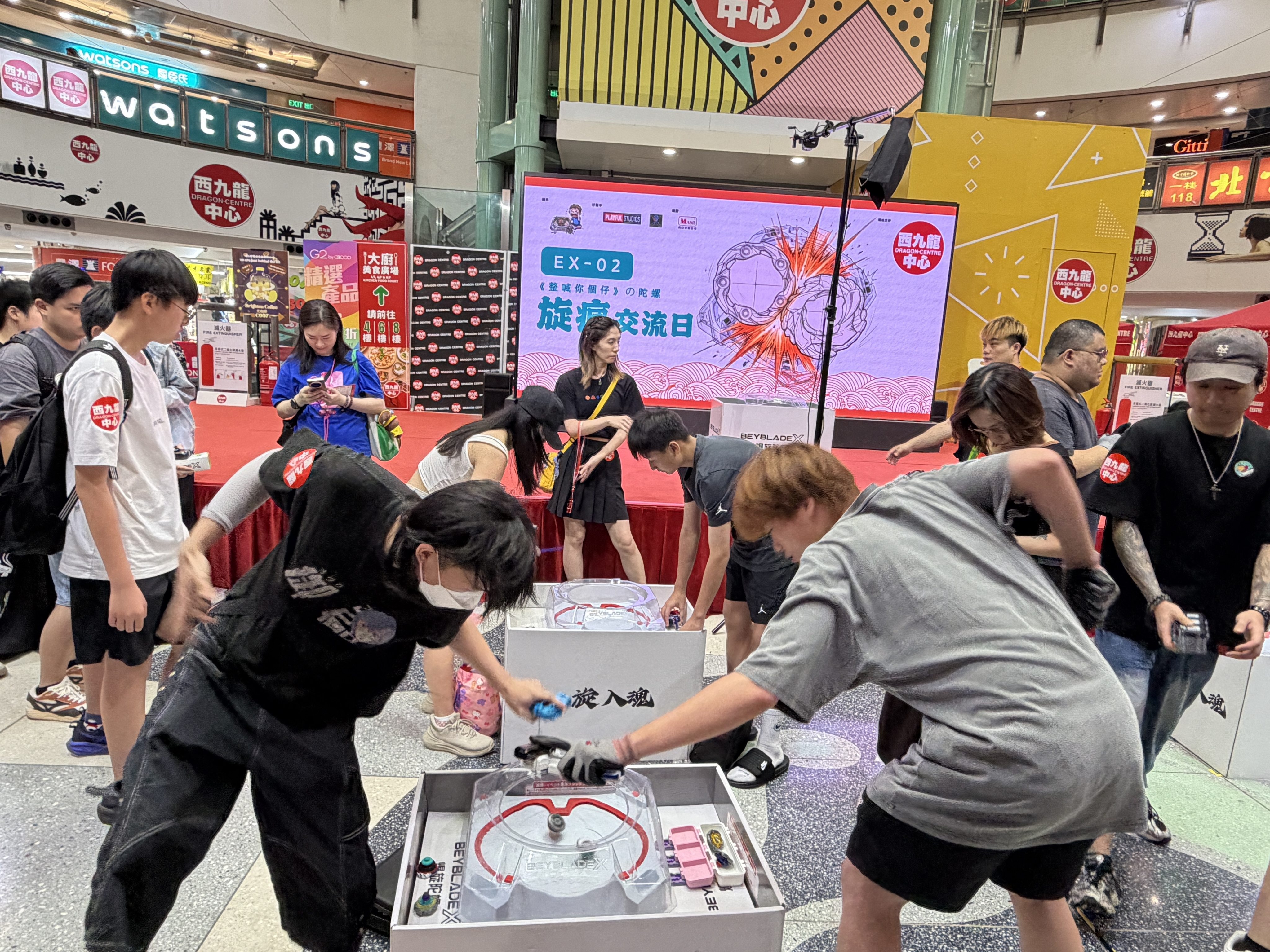 Beyblade X competitors battle before the finals at the Dragon Centre in Sham Shui Po, Hong Kong. Photo: Chloe Loung