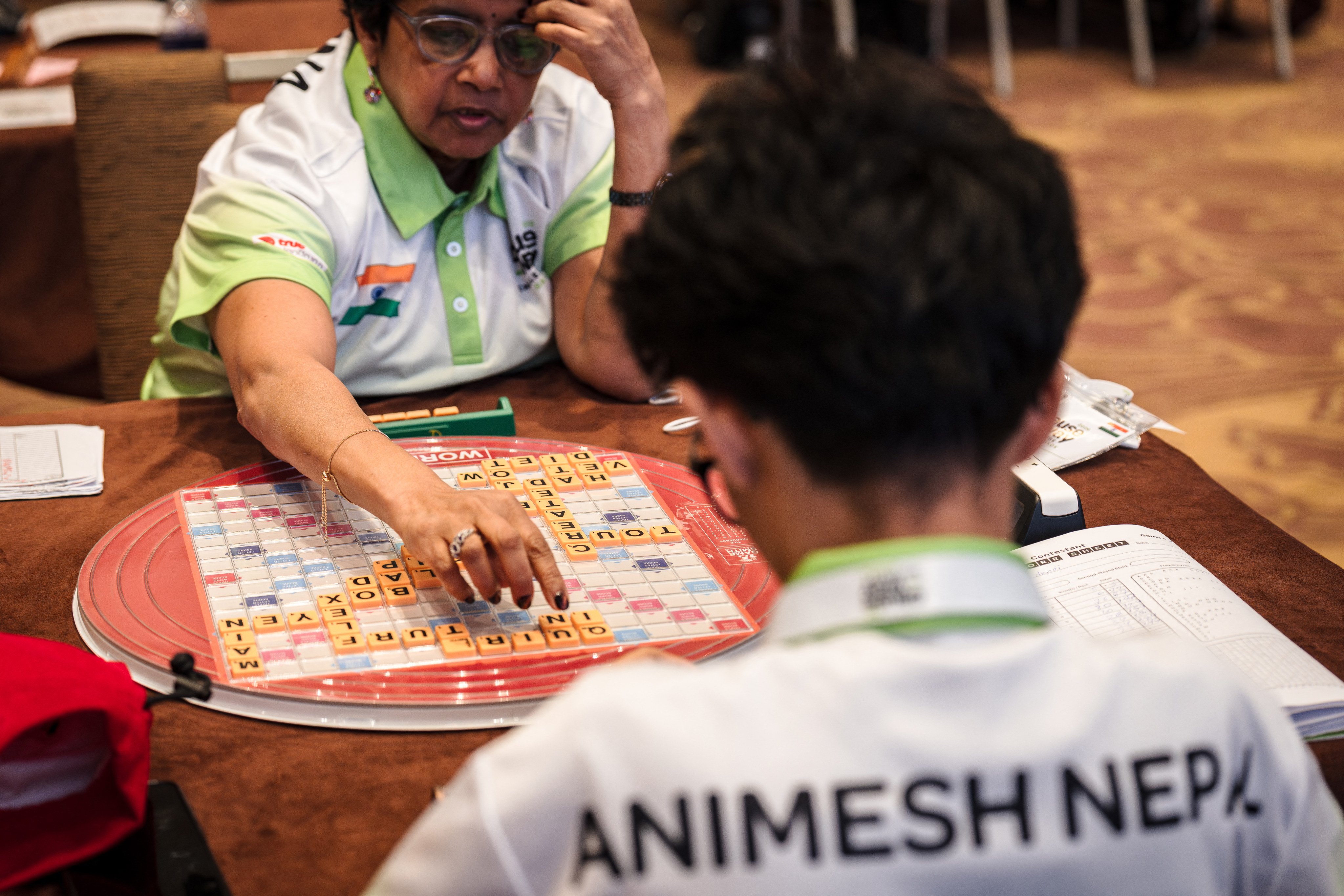 Participants compete in the Causeway Challenge Bangkok Scrabble competition in Bangkok on June 1, 2026. (Photo by chanakarn LAOSARAKHAM / AFP)