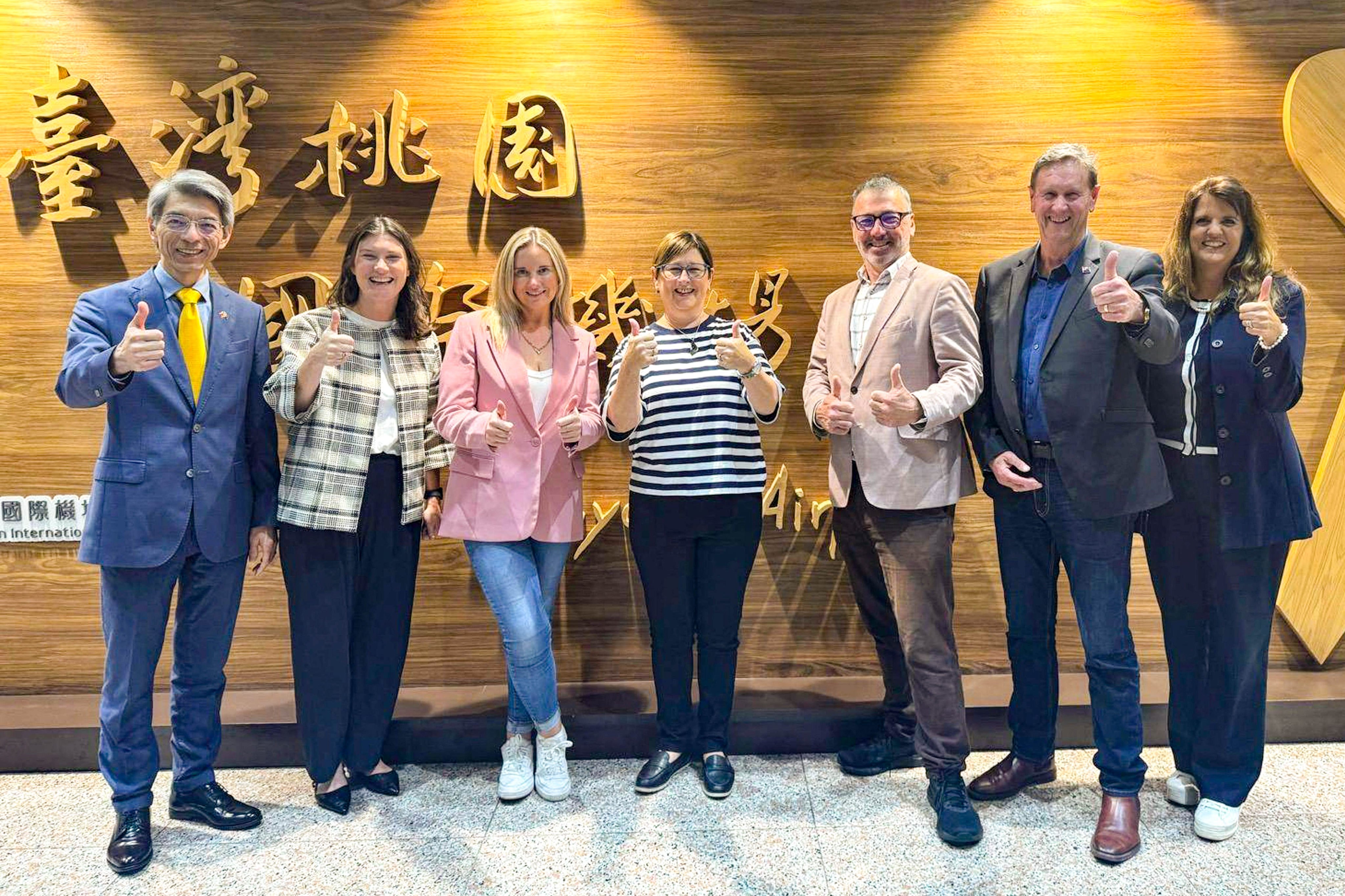 New Zealand MPs (from left to right) Laura McClure, Maureen Pugh, Duncan Webb and David Wilson posing for a group photo at the airport in Taoyuan. Photo: AFP