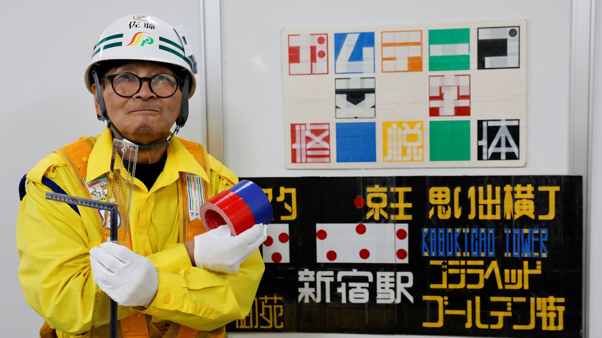 Shuetsu Sato, 72, has won awards for his font created from duct tape that is used to direct commuters at Tokyo’s busy Shinjuku Station