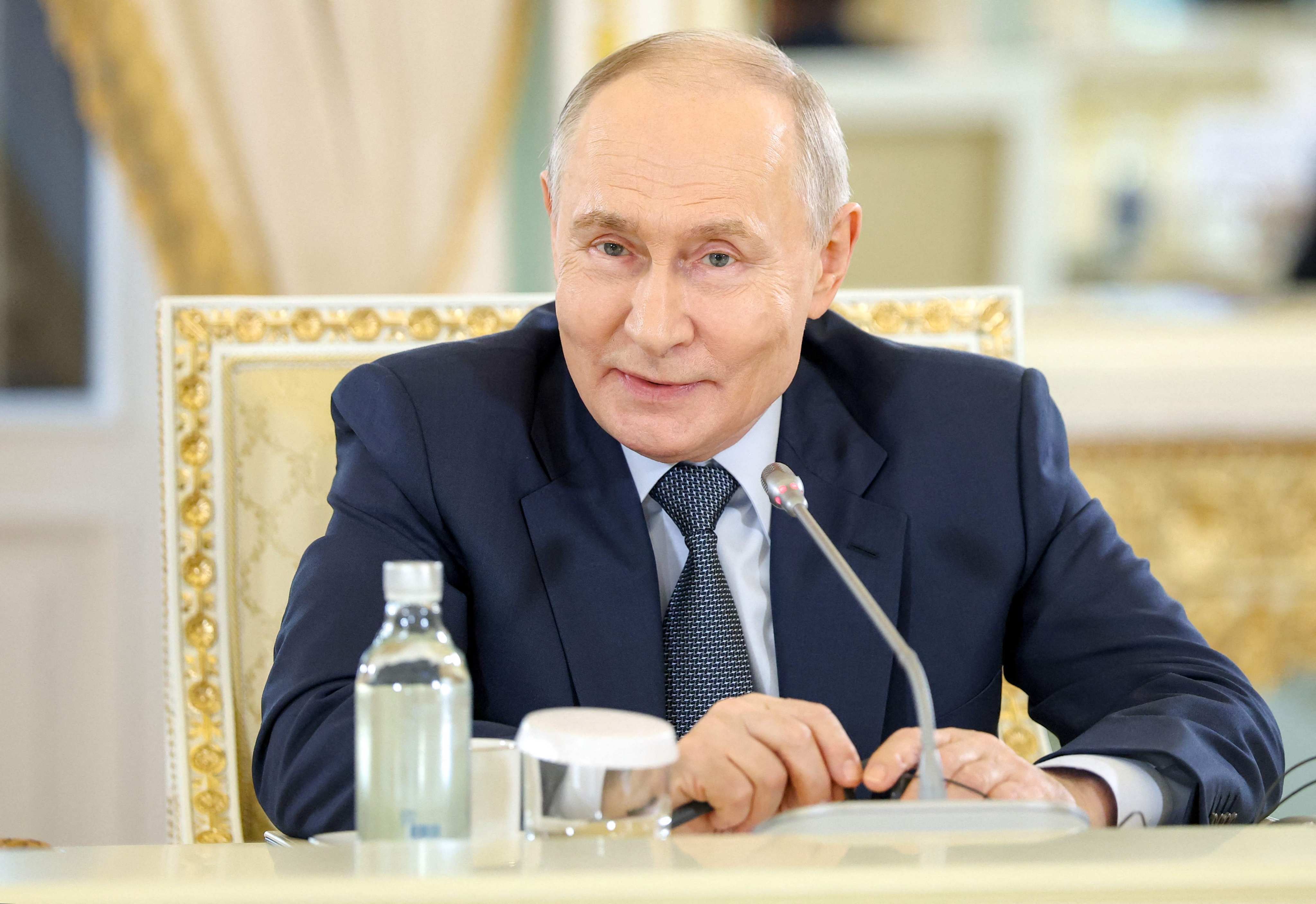 Russia’s President Vladimir Putin meets with representatives of international news agencies on the sidelines of the St Petersburg International Economic Forum on Thursday. Photo: AFP
