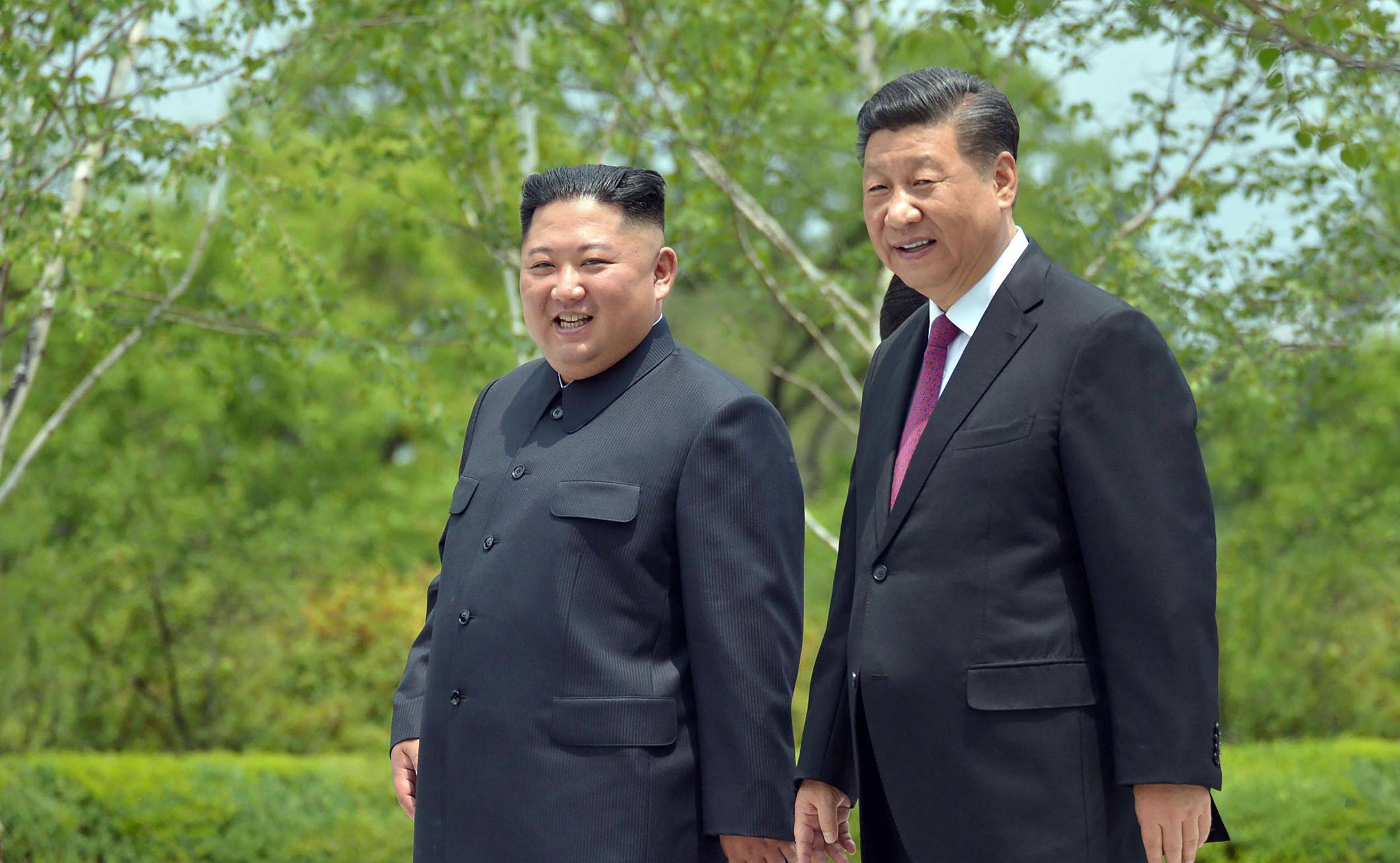North Korean leader Kim Jong Un (left) and Chinese President Xi Jinping in Pyongyang in 2019. Photo: AFP