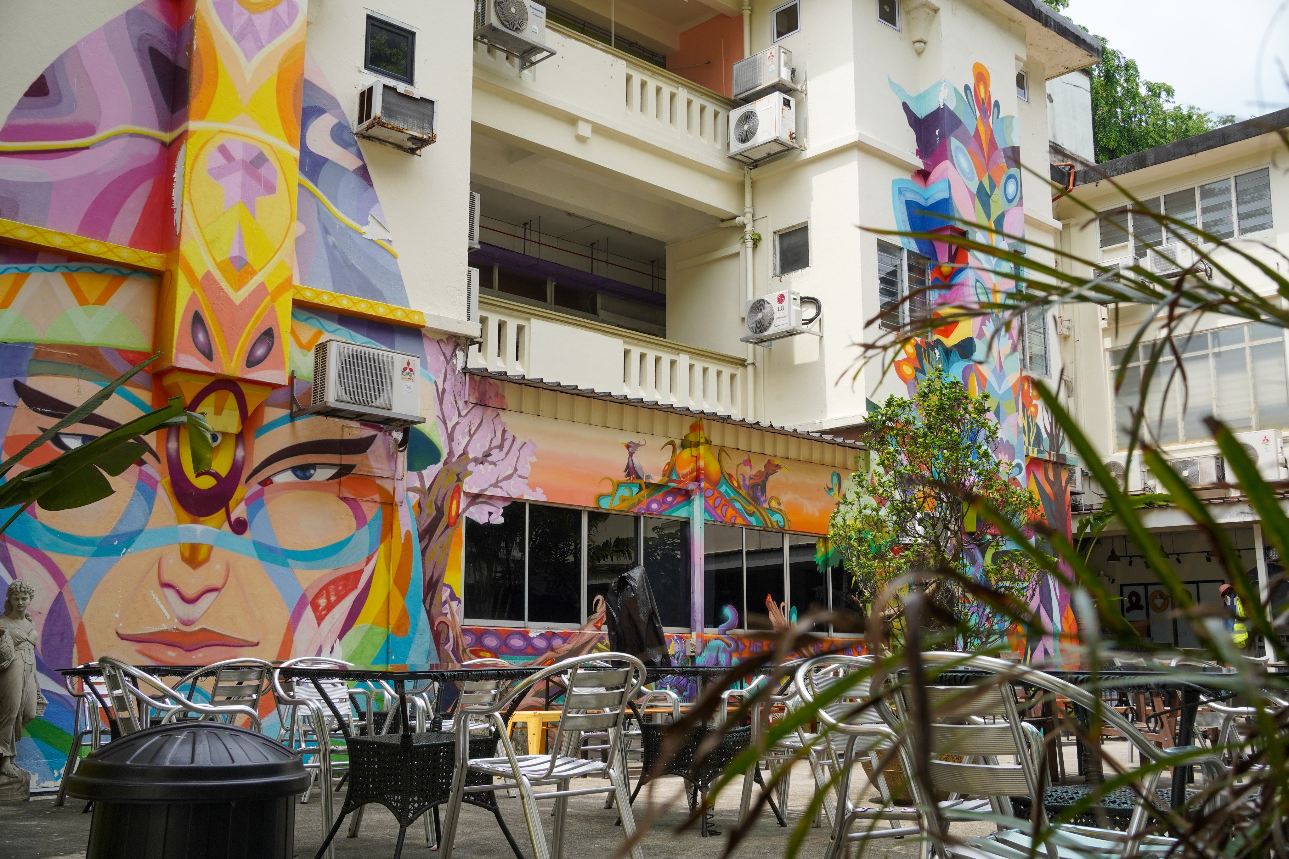 Murals adorn a wall at 195 Pearl’s Hill Terrace in Singapore. Photo: Kolette Lim