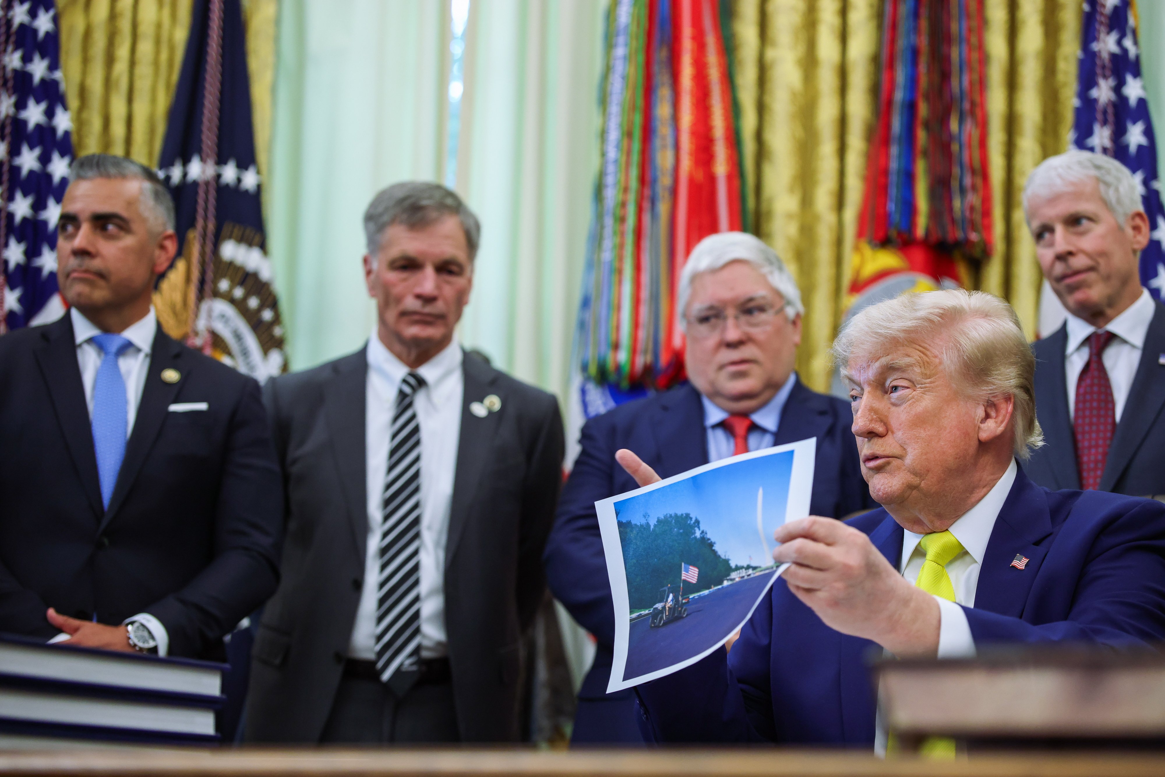 US President Donald Trump discusses renovations to the Lincoln Memorial Reflecting Pool in the Oval Office on Thursday. Photo: EPA