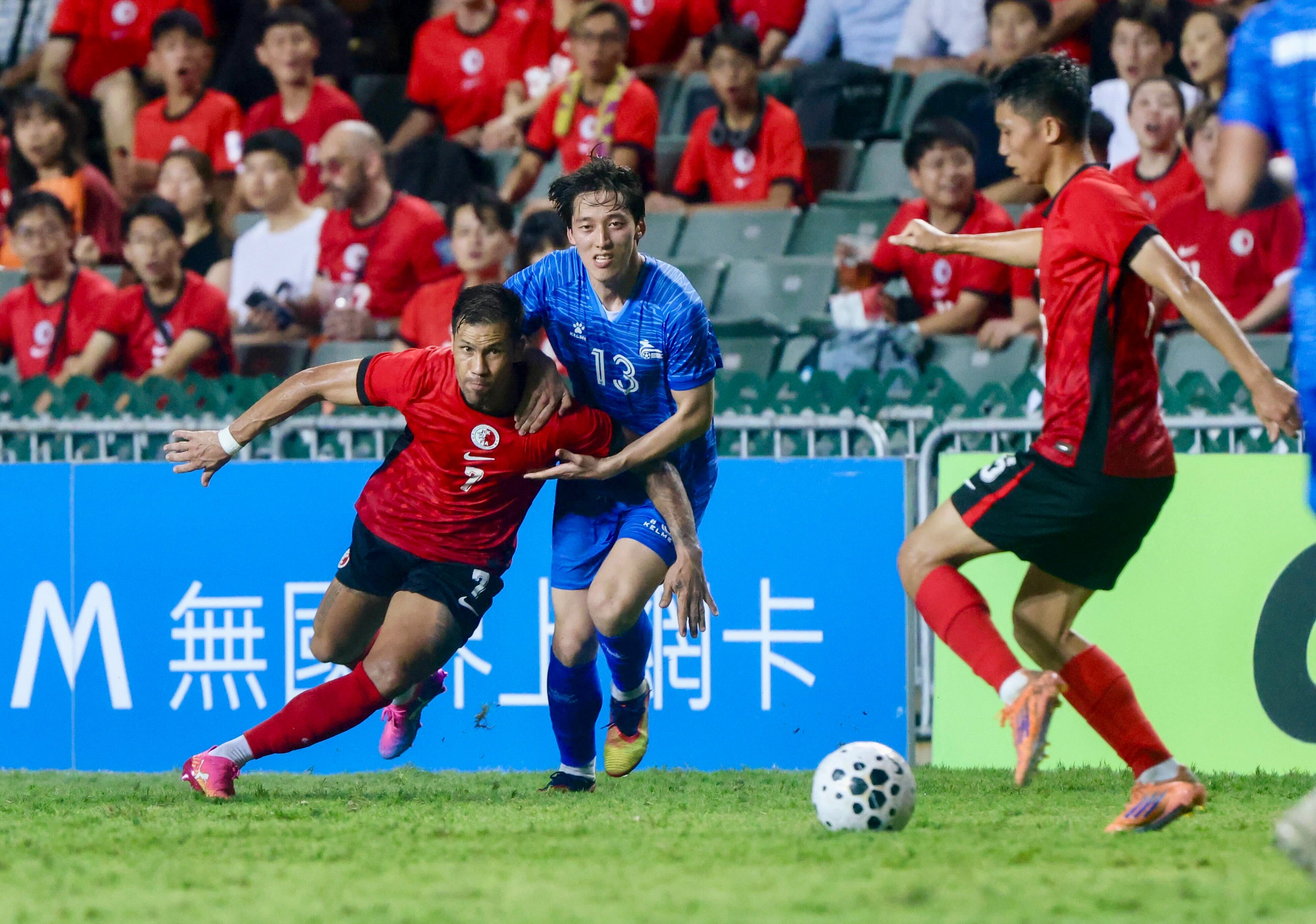 Hong Kong’s Juninho (left) scored his side’s first goal against Mongolia at Hong Kong Stadium. Photo: Jonathan Wong