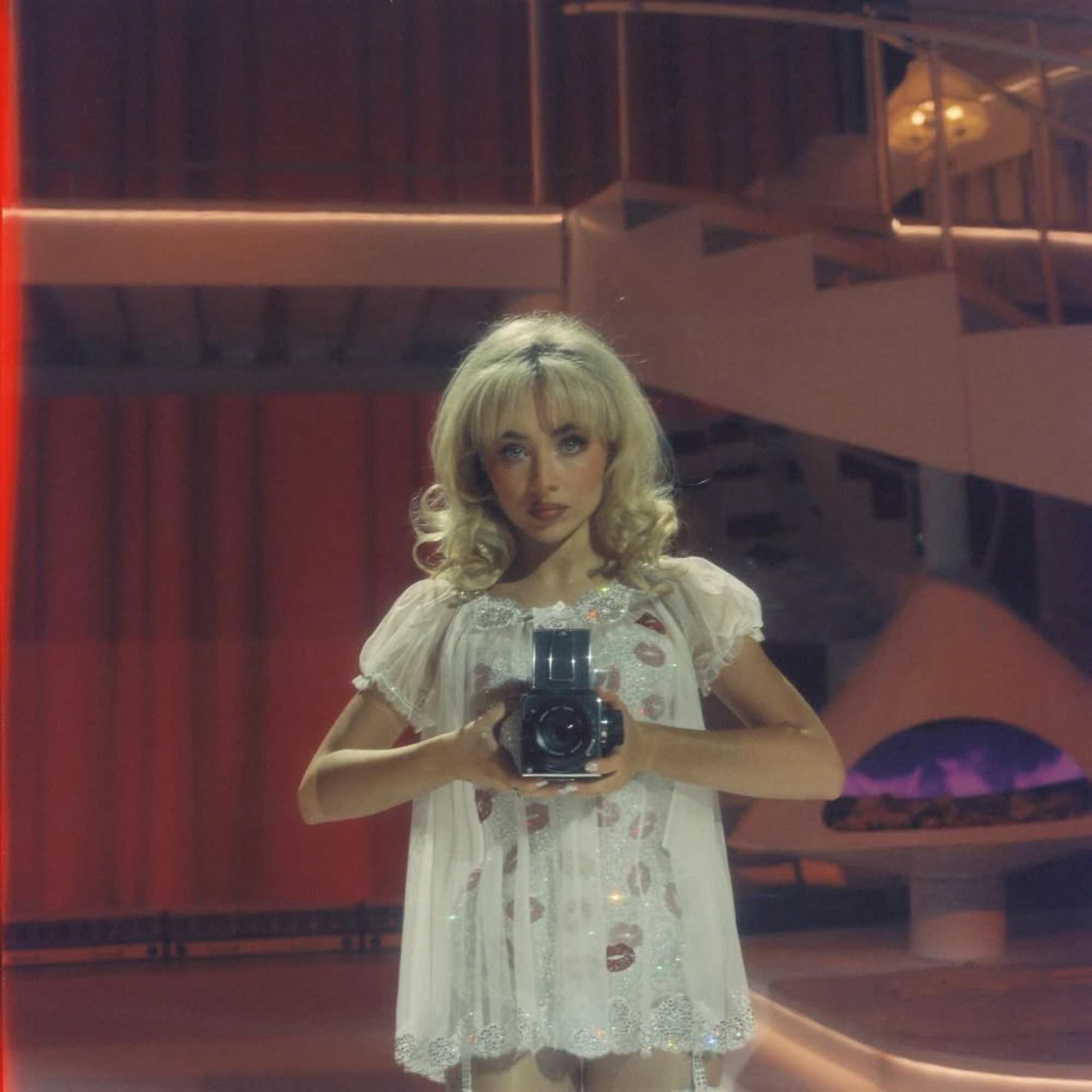 Sabrina Carpenter in a babydoll dress / Captured from @sabrinacarpenter/Instagram