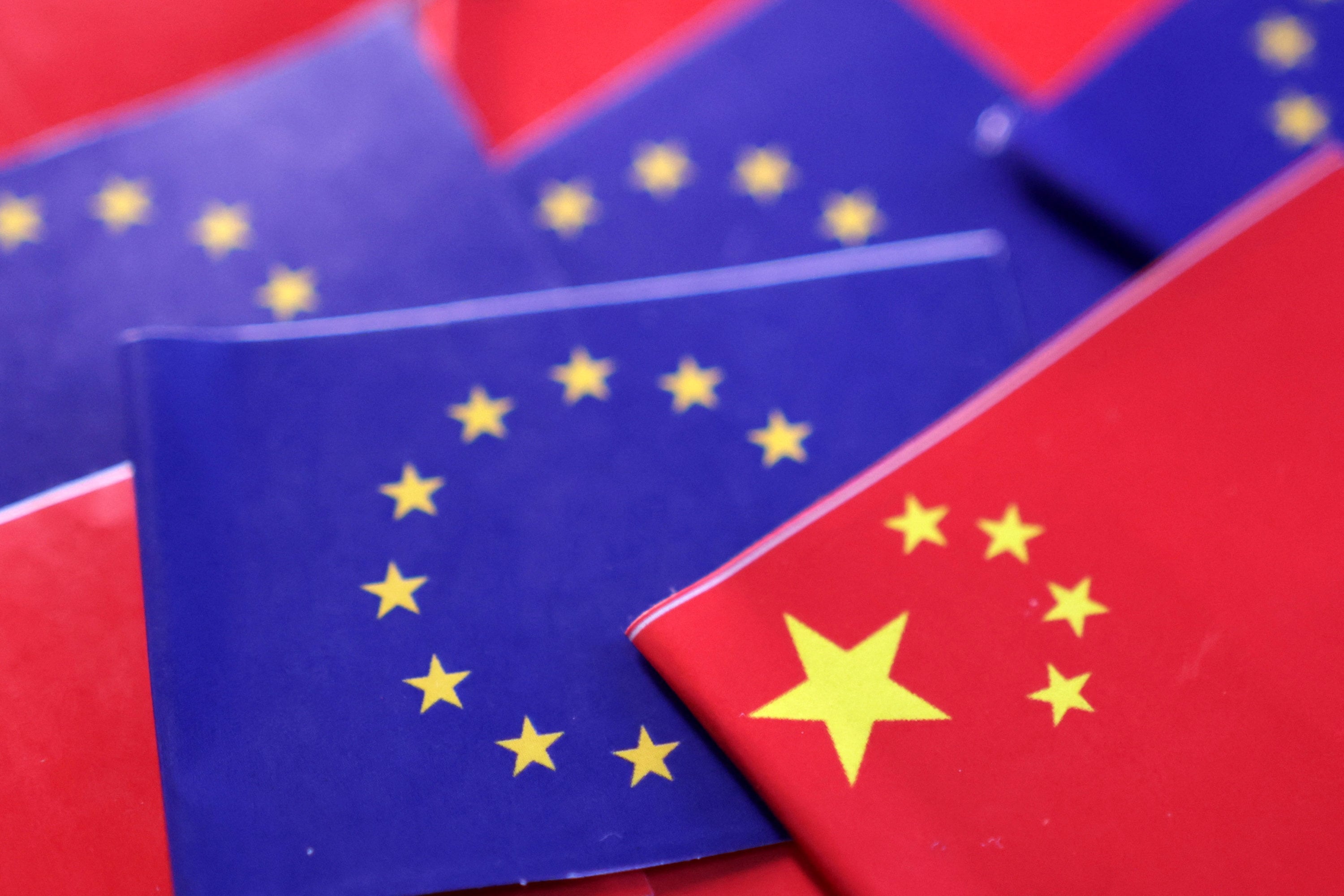 EU and Chinese flags. Illustration: Reuters