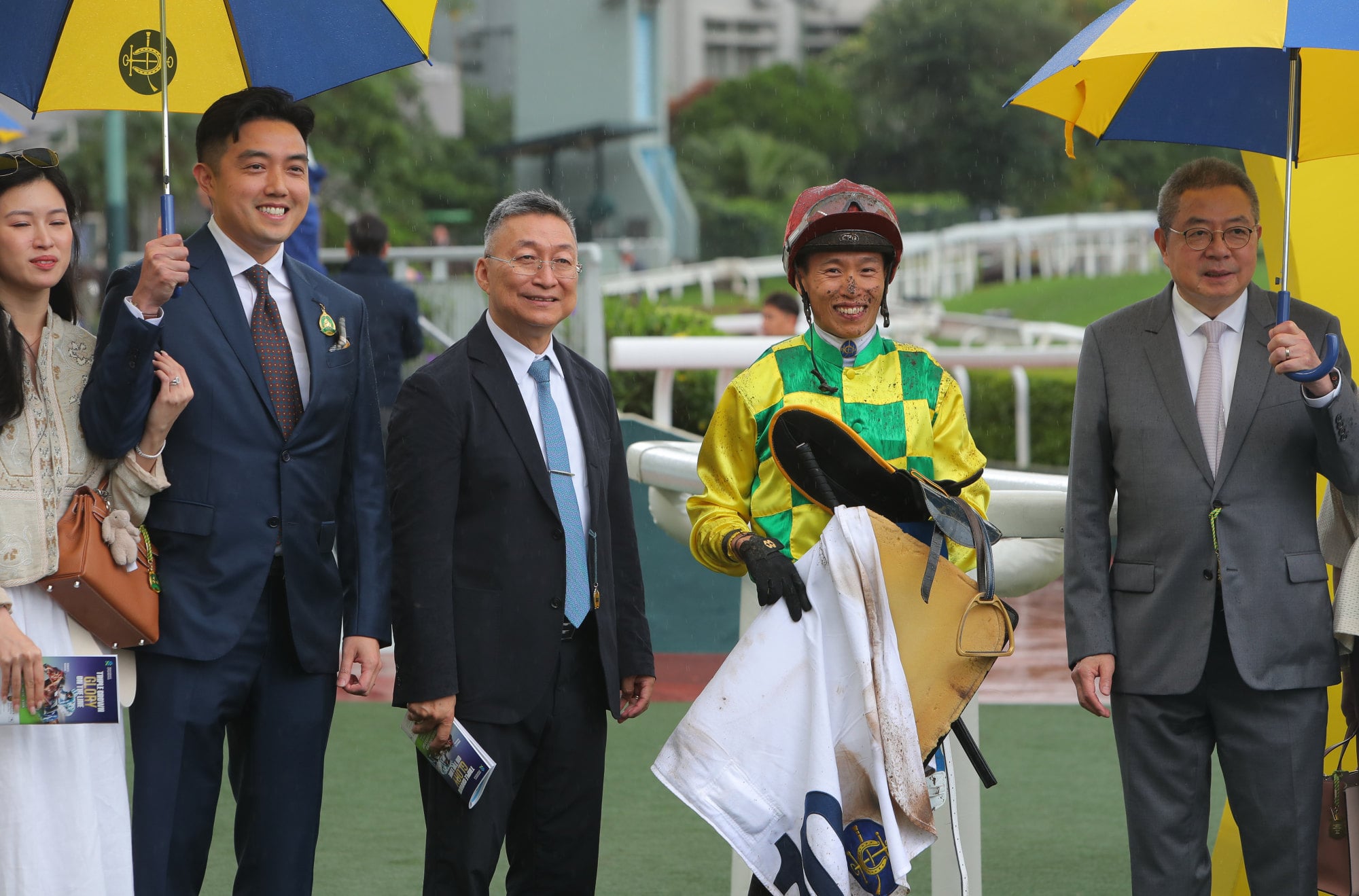 Jockey Vincent Ho, trainer Francis Lui (centre) and connections of Thunder Kit celebrate his first Hong Kong win.