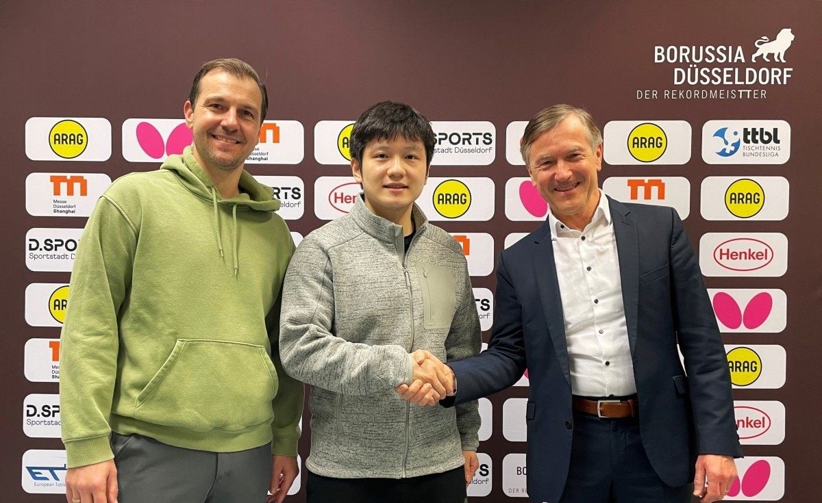 Andreas Preuss (right) with new signing Fan Zhendong and German table tennis legend Timo Boll. Photo: Handout