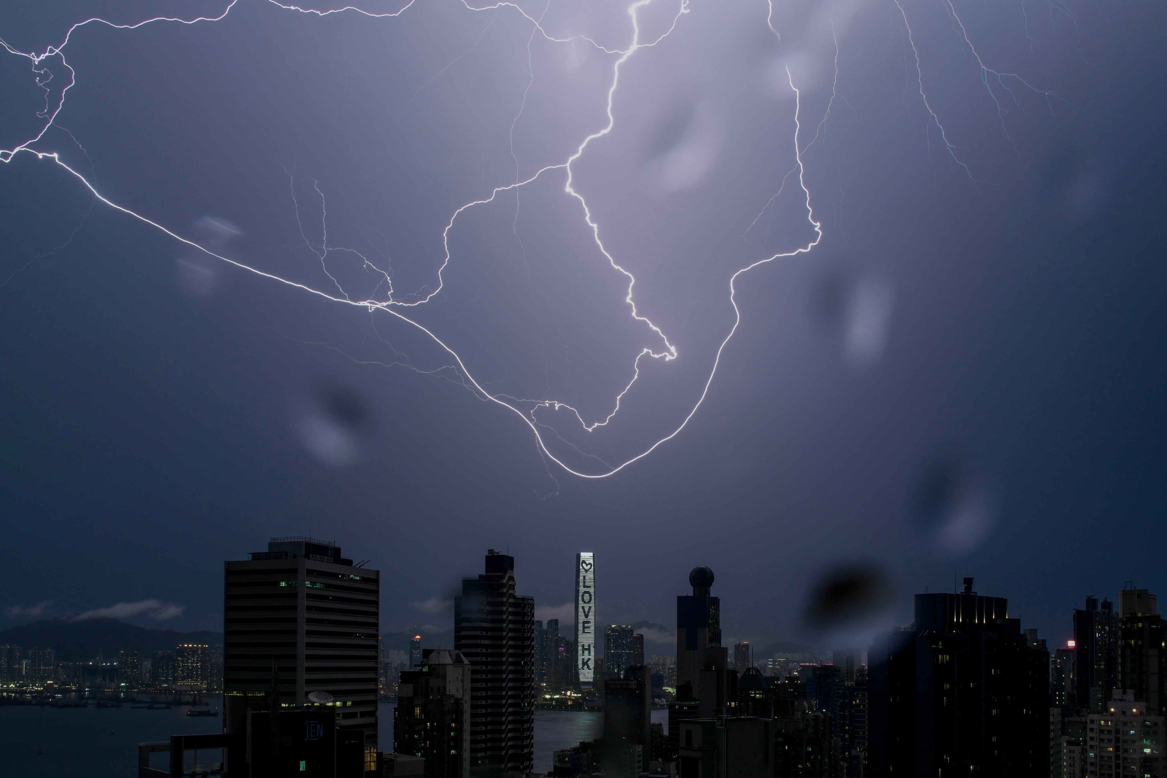 Lightning flashes over the Hong Kong skyline above Victoria Harbour. Photo: Karma Lo