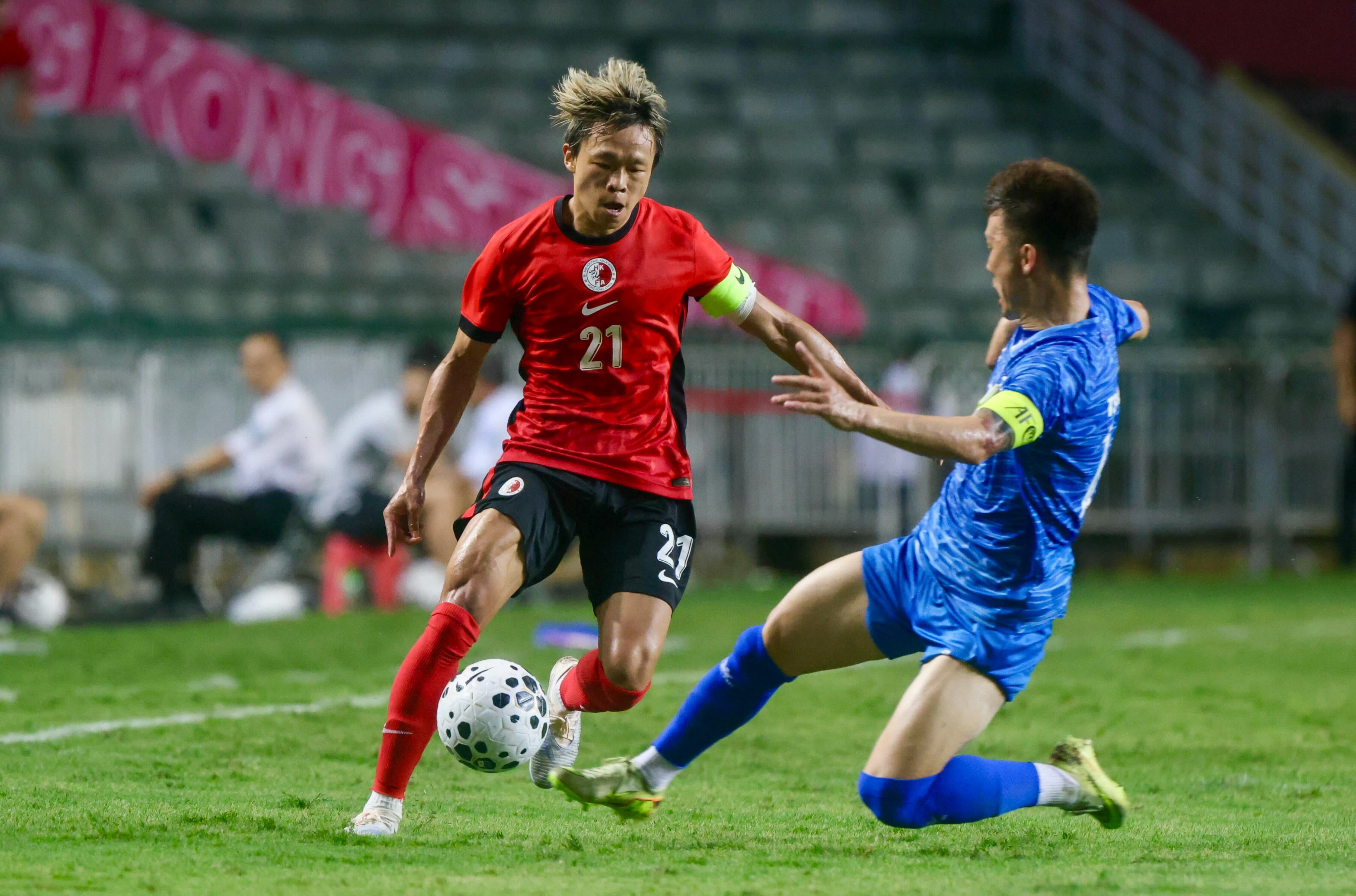 The dynamic Yue Tze-nam makes progress down Hong Kong’s right flank against Mongolia. Photo: Jonathan Wong