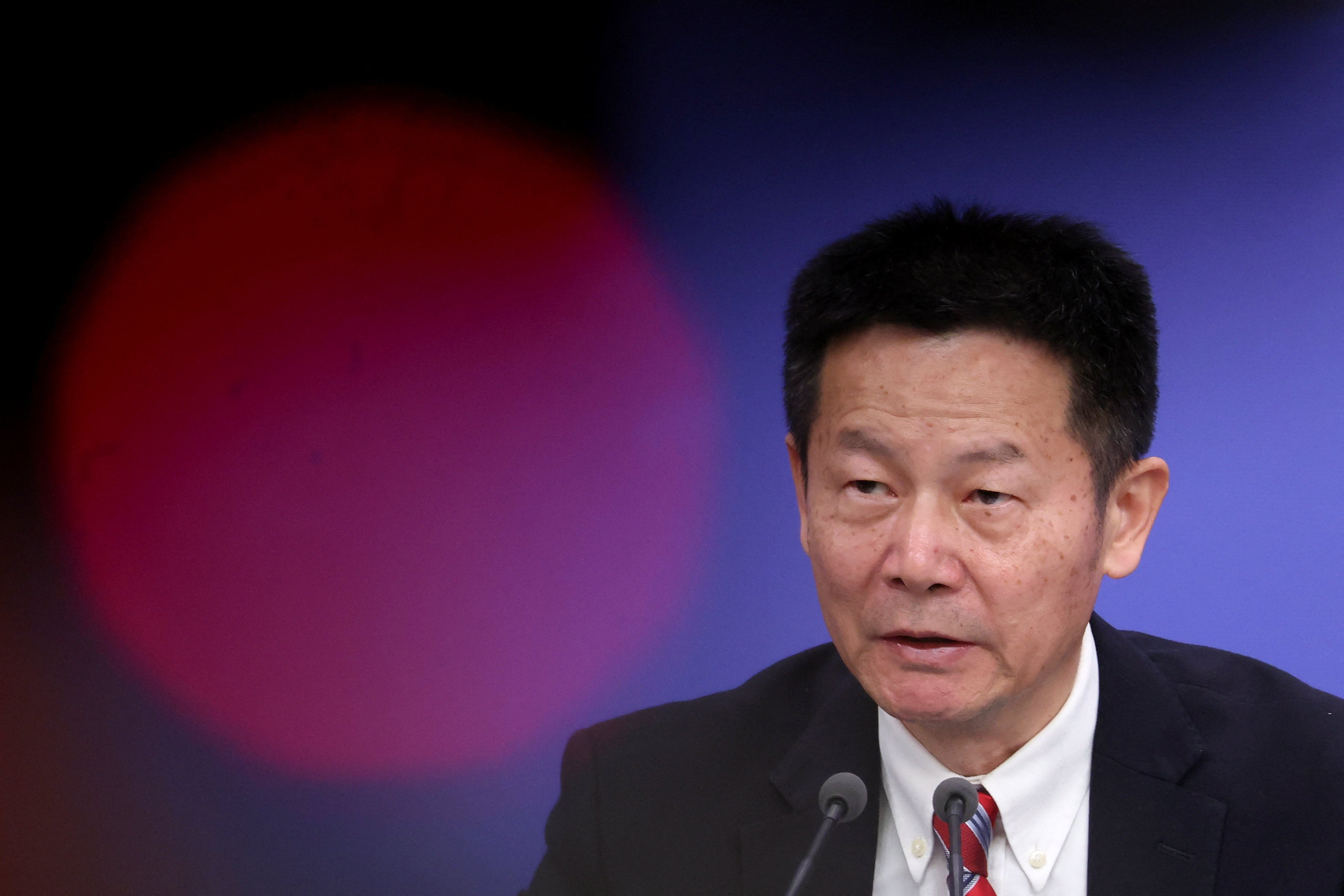 Wu Qing, chairman of the China Securities Regulatory Commission, speaks at a press conference on the sidelines of the National People’s Congress in Beijing in March. Photo: Reuters