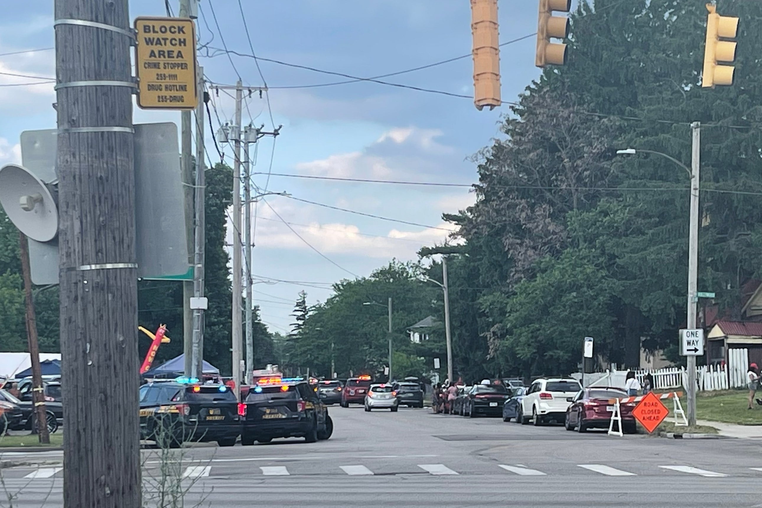 Police officers work at the scene of a shooting near a festival in Toledo, Ohio, on Saturday. Photo: WTVG via AP