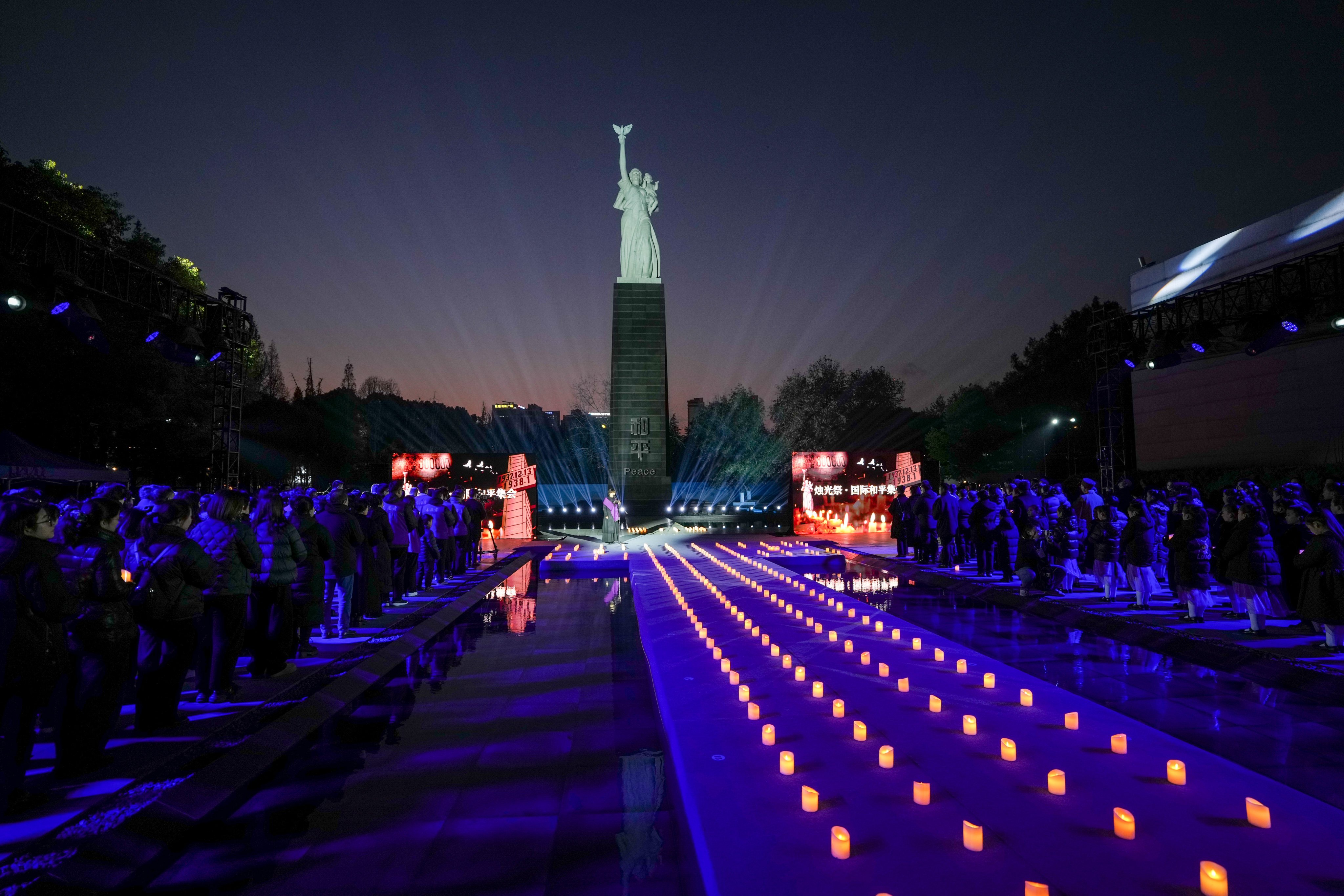 People attend a memorial for the Nanking massacre victims in Nanjing, China’s Jiangsu province, last year. Photo: Xinhua