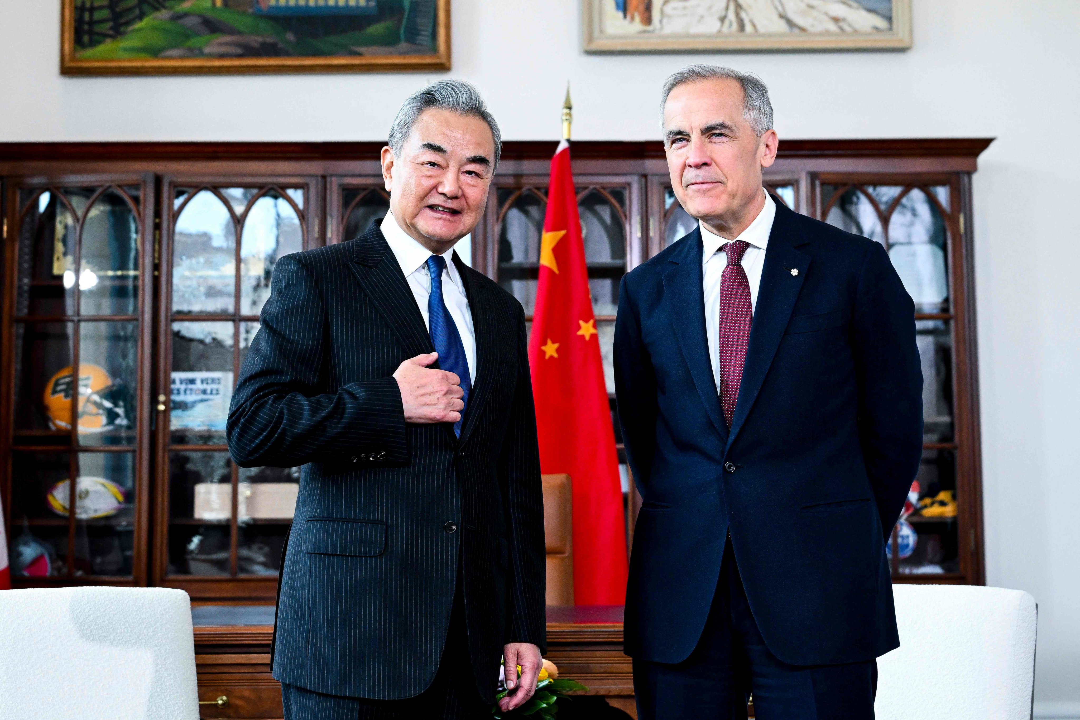 Canadian Prime Minister Mark Carney pictured with Chinese Foreign Minister Wang Yi in his office in Ottawa on May 29. Photo: AFP
