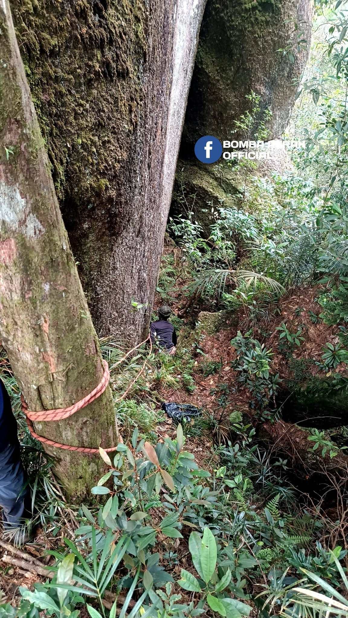 A Malaysian rescuer combs an area near Gunung Batu Putih mountain in Perak state. Photo: Facebook/BombaPerakofficial