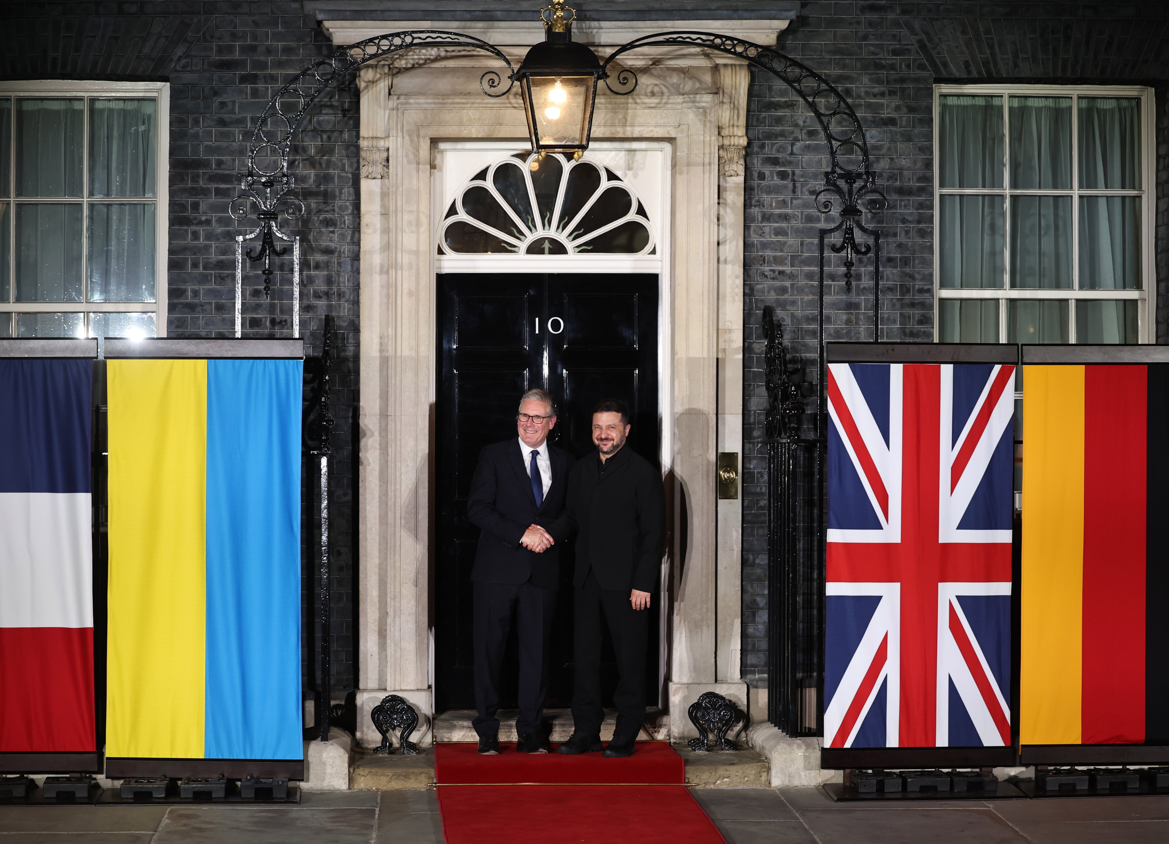 Britain’s Prime Minister Keir Starmer, left, says goodbye to Ukrainian President Volodymyr Zelensky after a meeting at 10 Downing Street in London, UK on Sunday. Photo: EPA