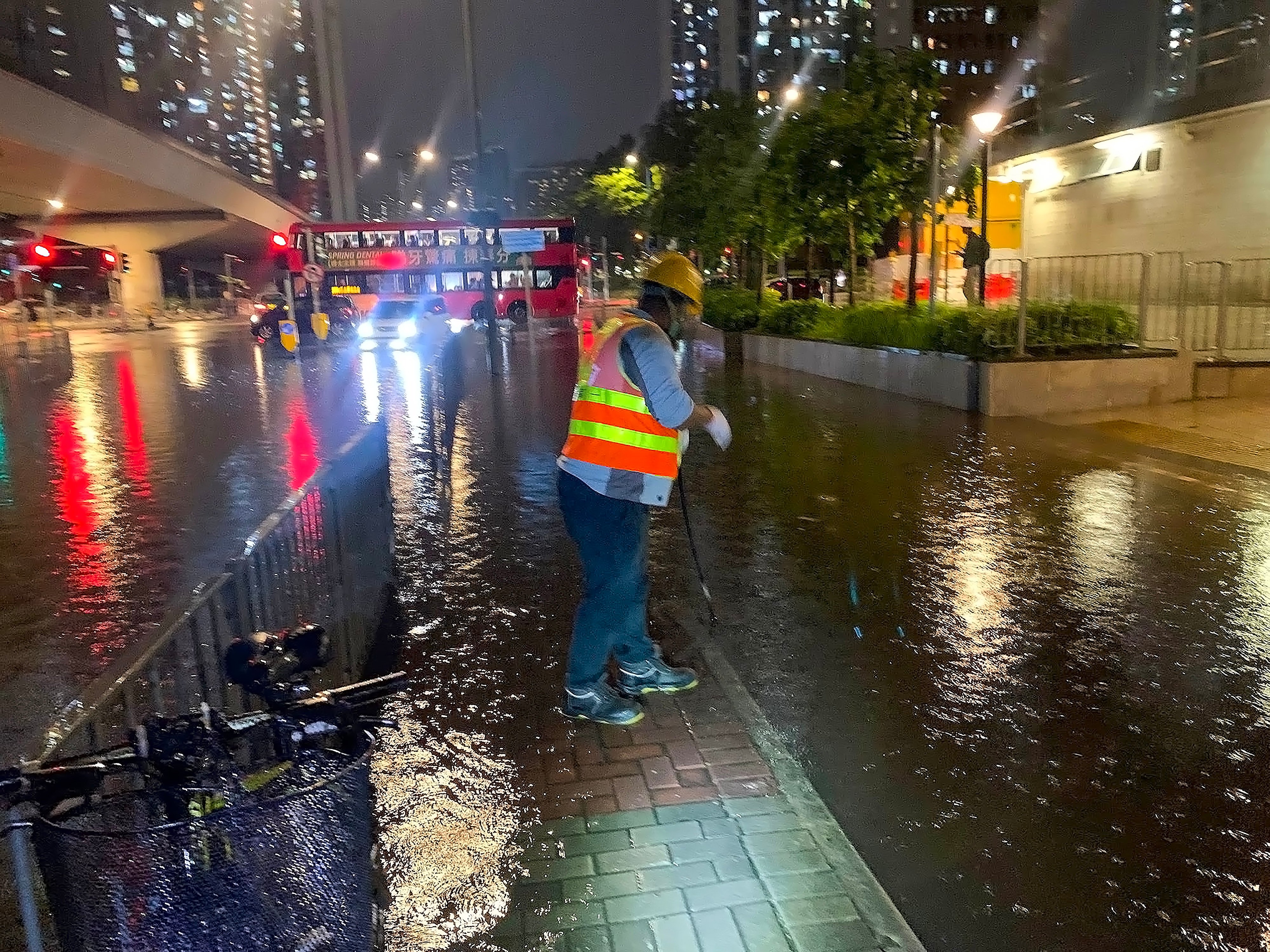 The Drainage Services Department sent out teams to handle flooding in various areas. Photo: Facebook/drainy.hk
