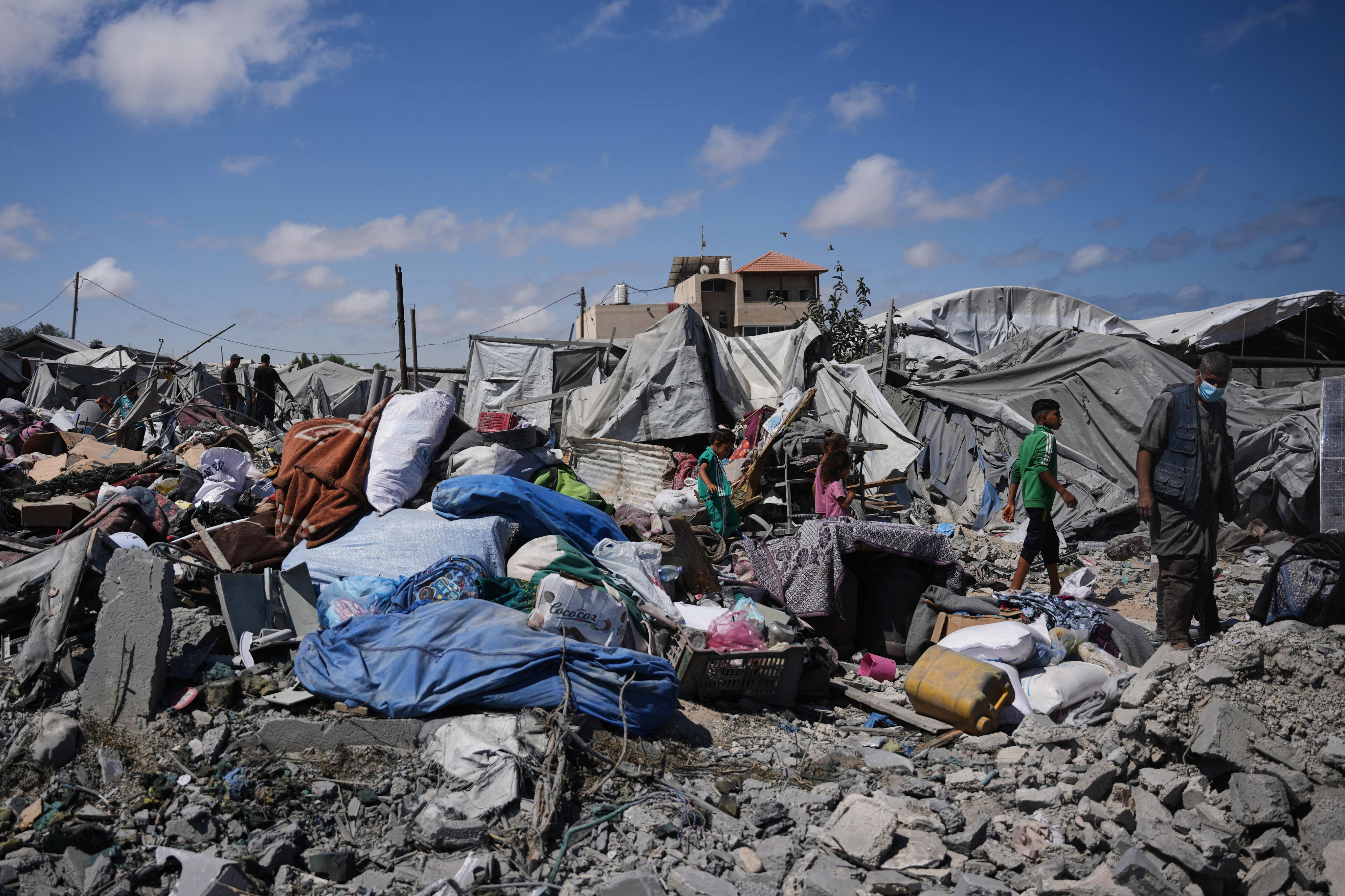 Gaza’s tent camps face a sanitation crisis, with families building makeshift toilets for privacy and dignity amid a lack of proper facilities. Photo: AP