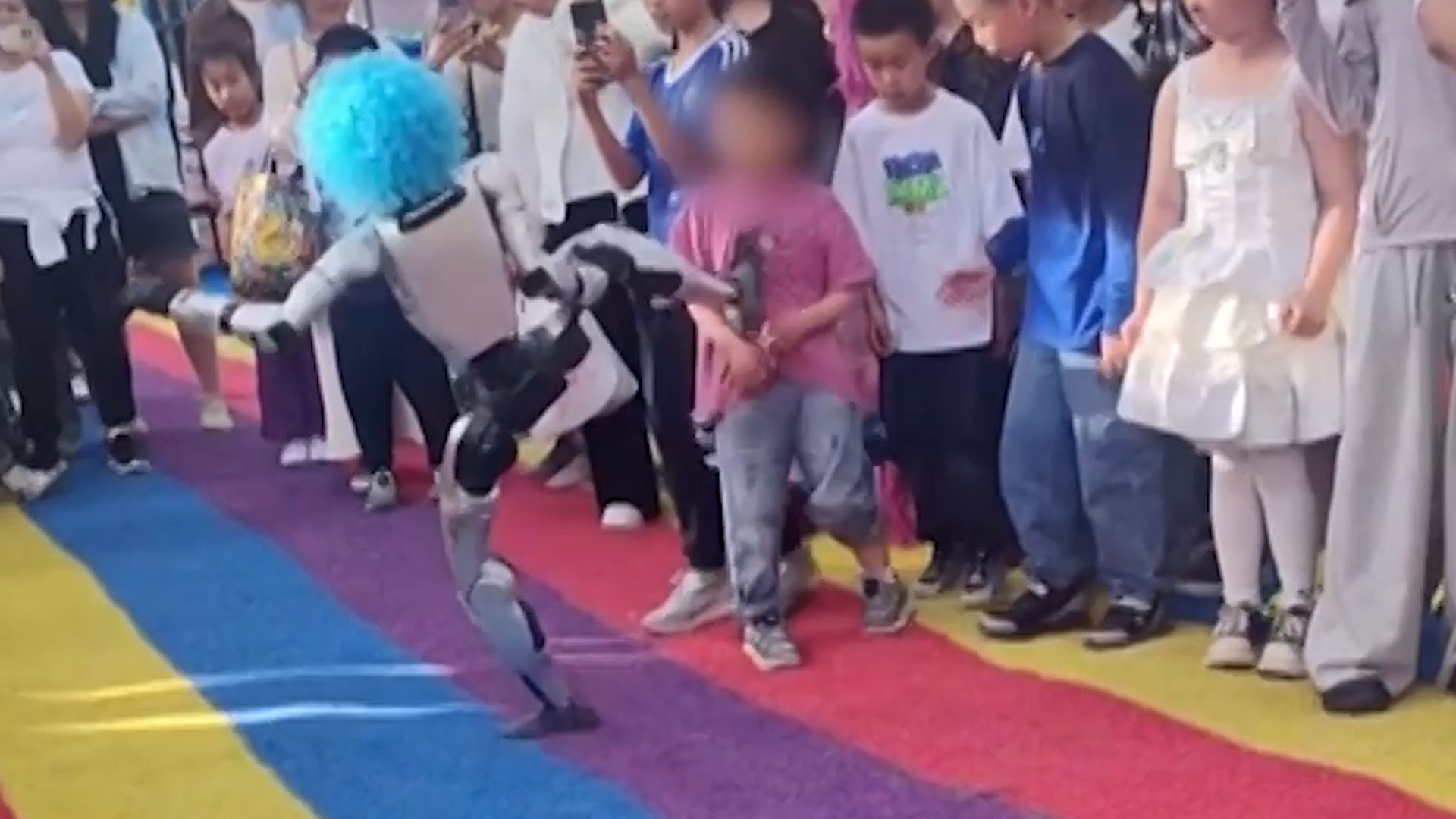 Video thumbnail for “Humanoid robot kicks child during performance in China’s western Xinjiang region”