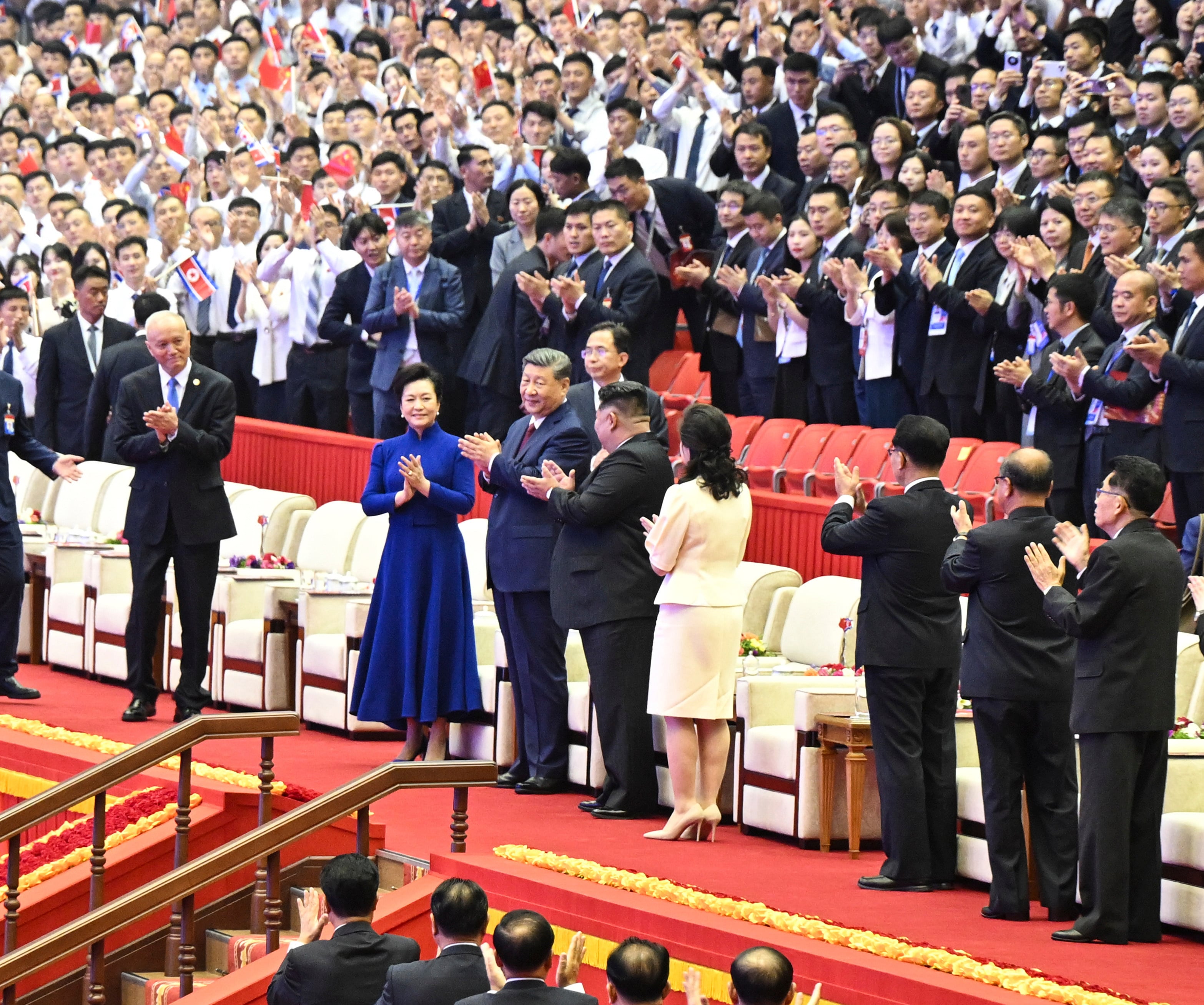 Chinese President Xi Jinping and his wife Peng Liyuan, along with North Korean leader Kim Jong-un and his wife Ri Sol-ju, watch a performance at the Pyongyang Gymnasium in Pyongyang on June 8. Photo: Xinhua