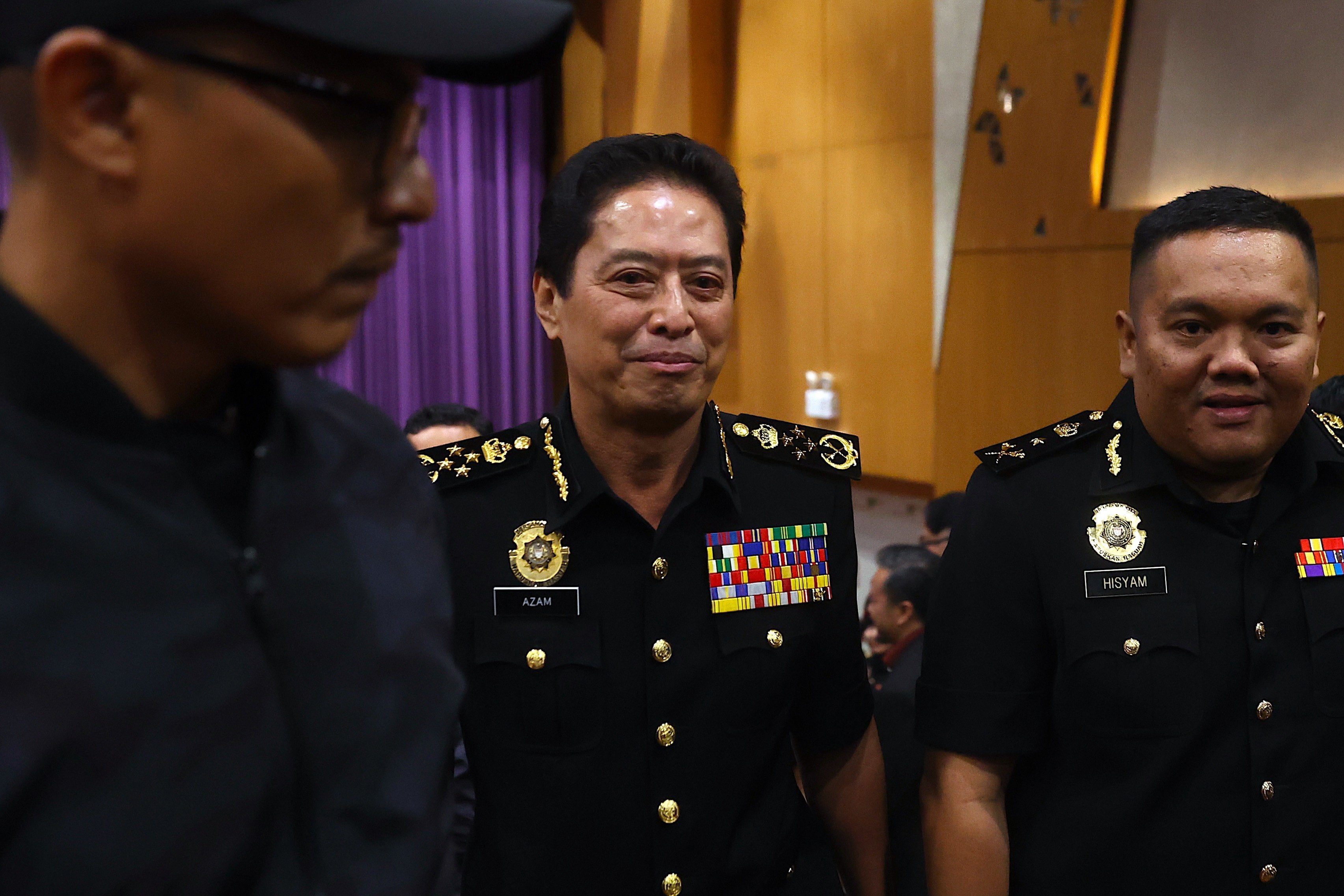Malaysia’s former anti-corruption chief Azam Baki (centre). Photo: EPA