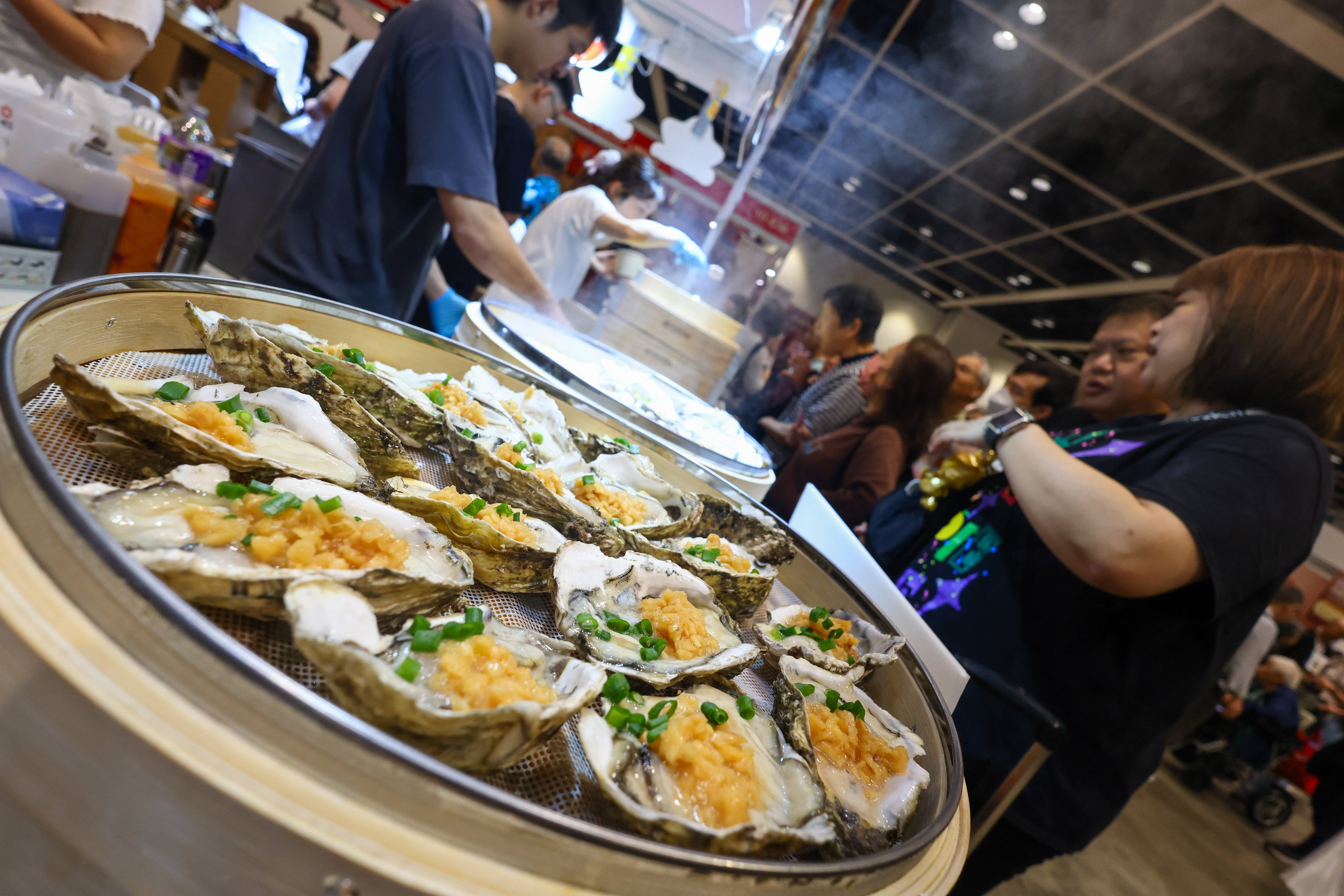 Oysters are sold at a food stall at the Hong Kong International Food Tasting Festival 2026 at the Hong Kong Convention and Exhibition Centre in Wan Chai on April 3, 2026. At a unrelated dinner, SCMP food editor Charmaine Mok suffered a nasty bout of food poisoning after eating just one bite of oyster. Photo: Dickson Lee