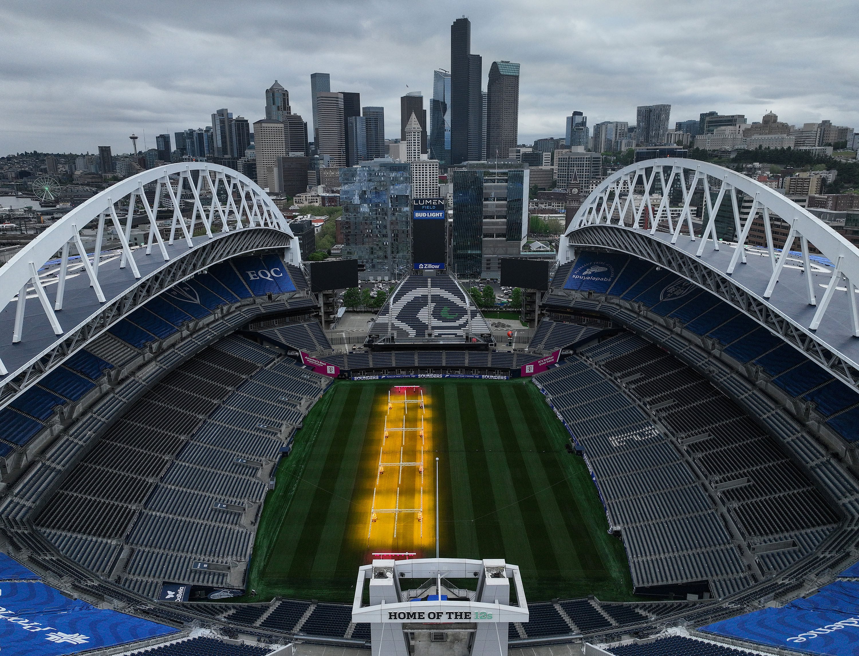 Grass grows beneath lamps in Seattle Stadium on May 6, ahead of the World Cup. There will be 48 national teams, more than ever before, playing in the United States, Mexico and Canada. Photo: TNS