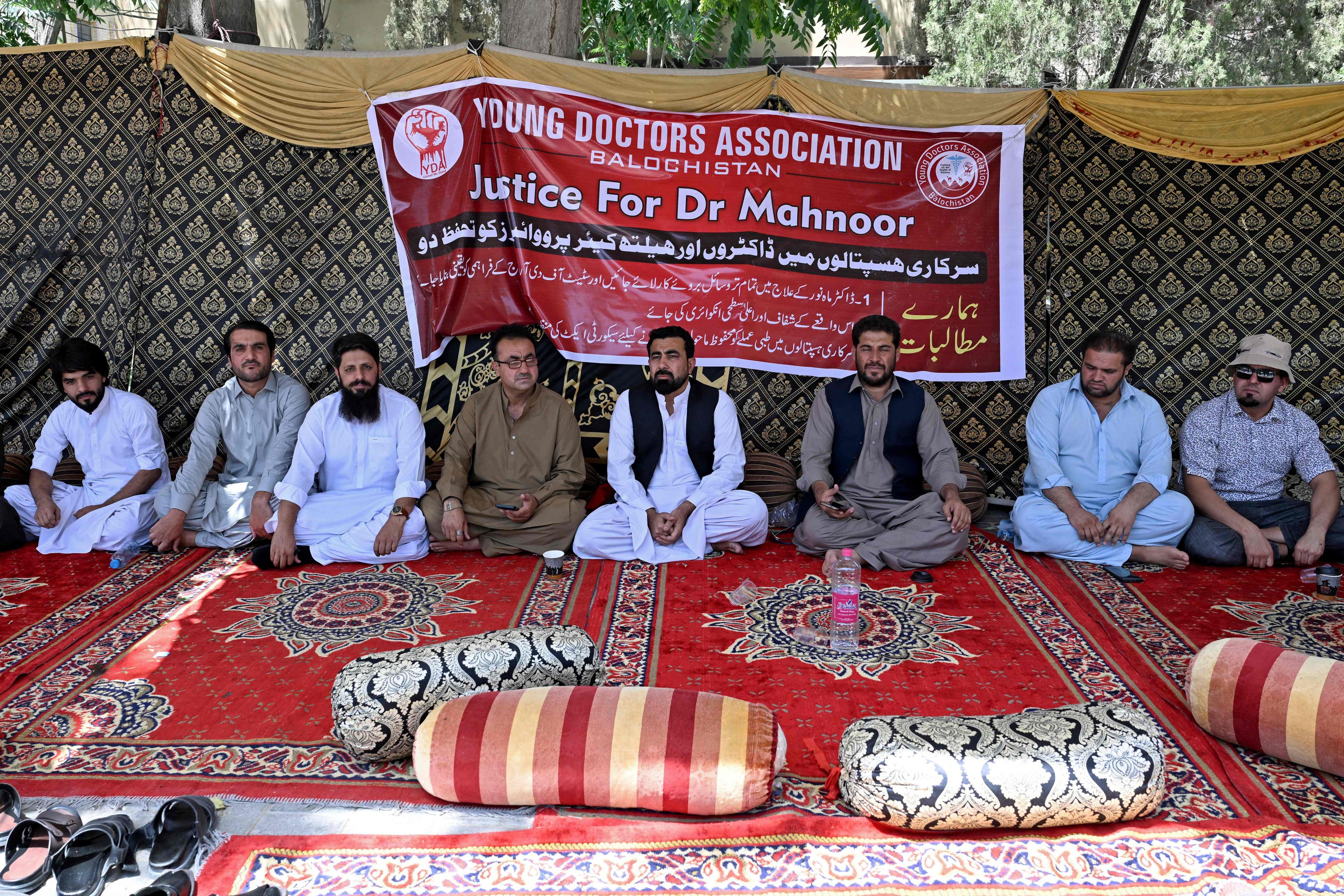 Medical practitioners stage a protest to express solidarity with acid attack victim Mahnoor Nasir in Quetta on Tuesday. Photo: AFP