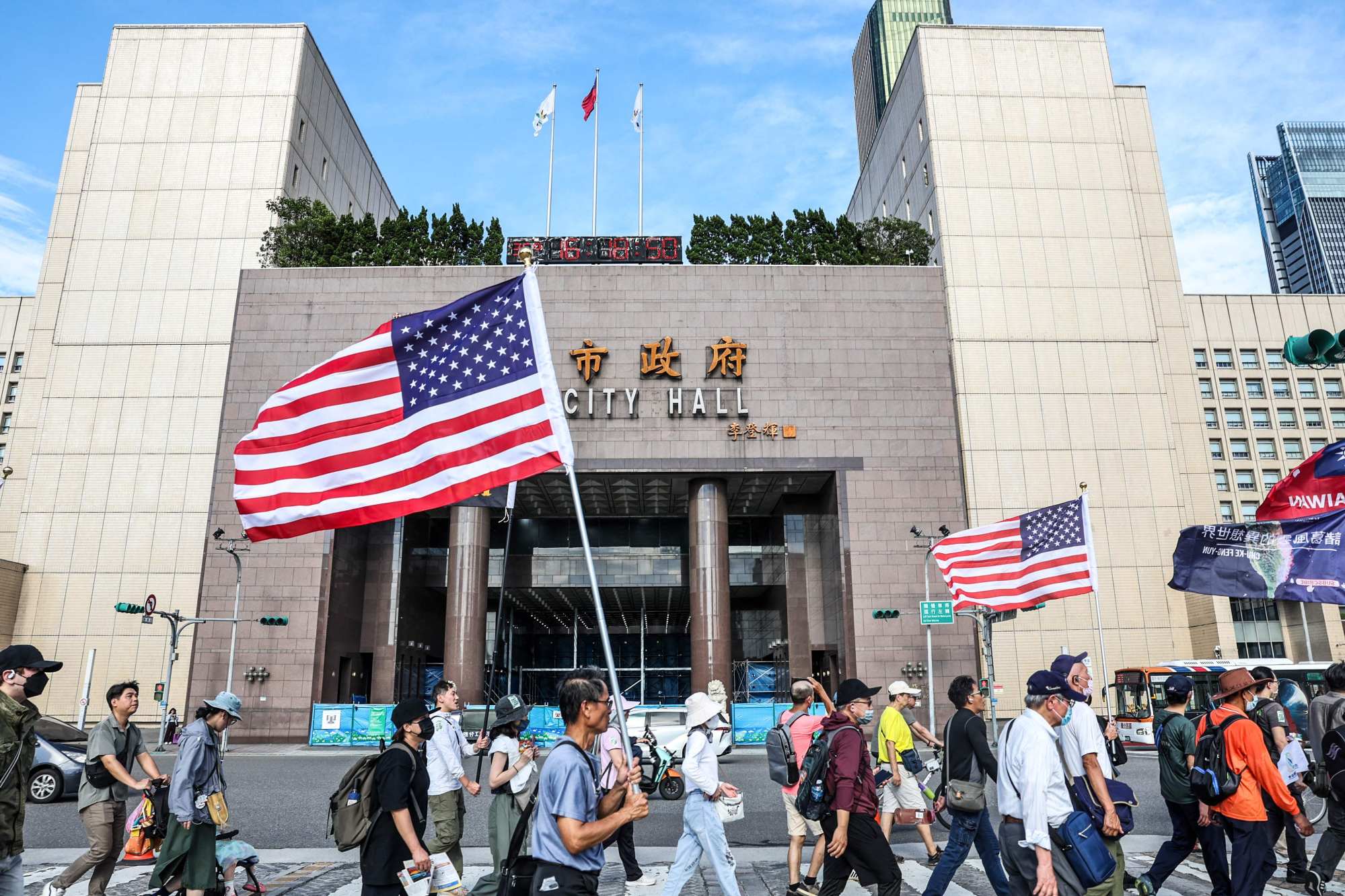 Protesters march to oppose a scaled-down defence budget passed by the legislature in Taipei on May 23. Photo: AFP Protesters march to oppose a scaled-down defence budget passed by the legislature in Taipei on May 23. Photo: AFP