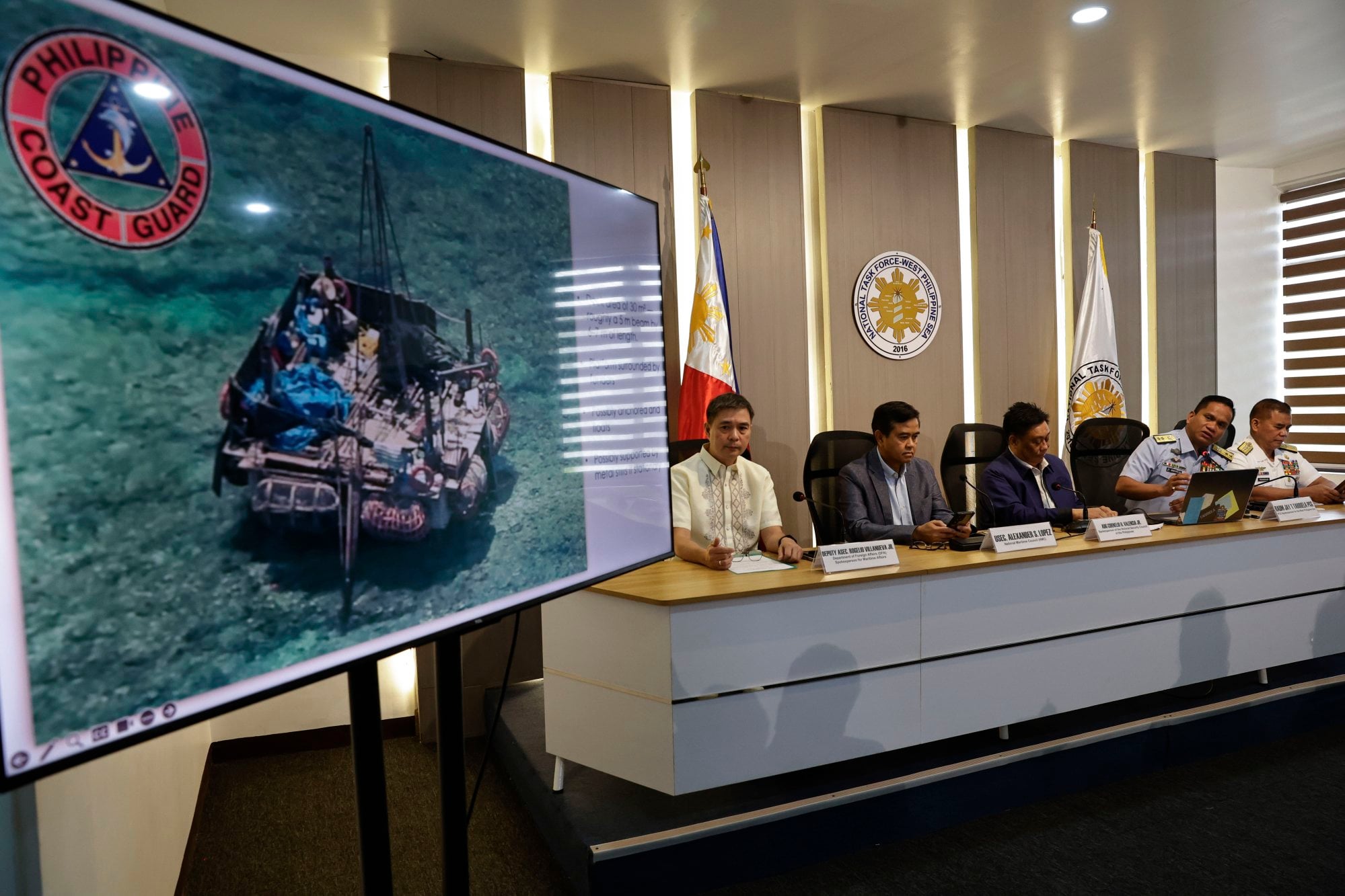 Philippine Coast Guard spokesman Jay Tarriela (second from right) during a press briefing on Wednesday. Photo: EPA Philippine Coast Guard spokesman Jay Tarriela (second from right) during a press briefing on Wednesday. Photo: EPA