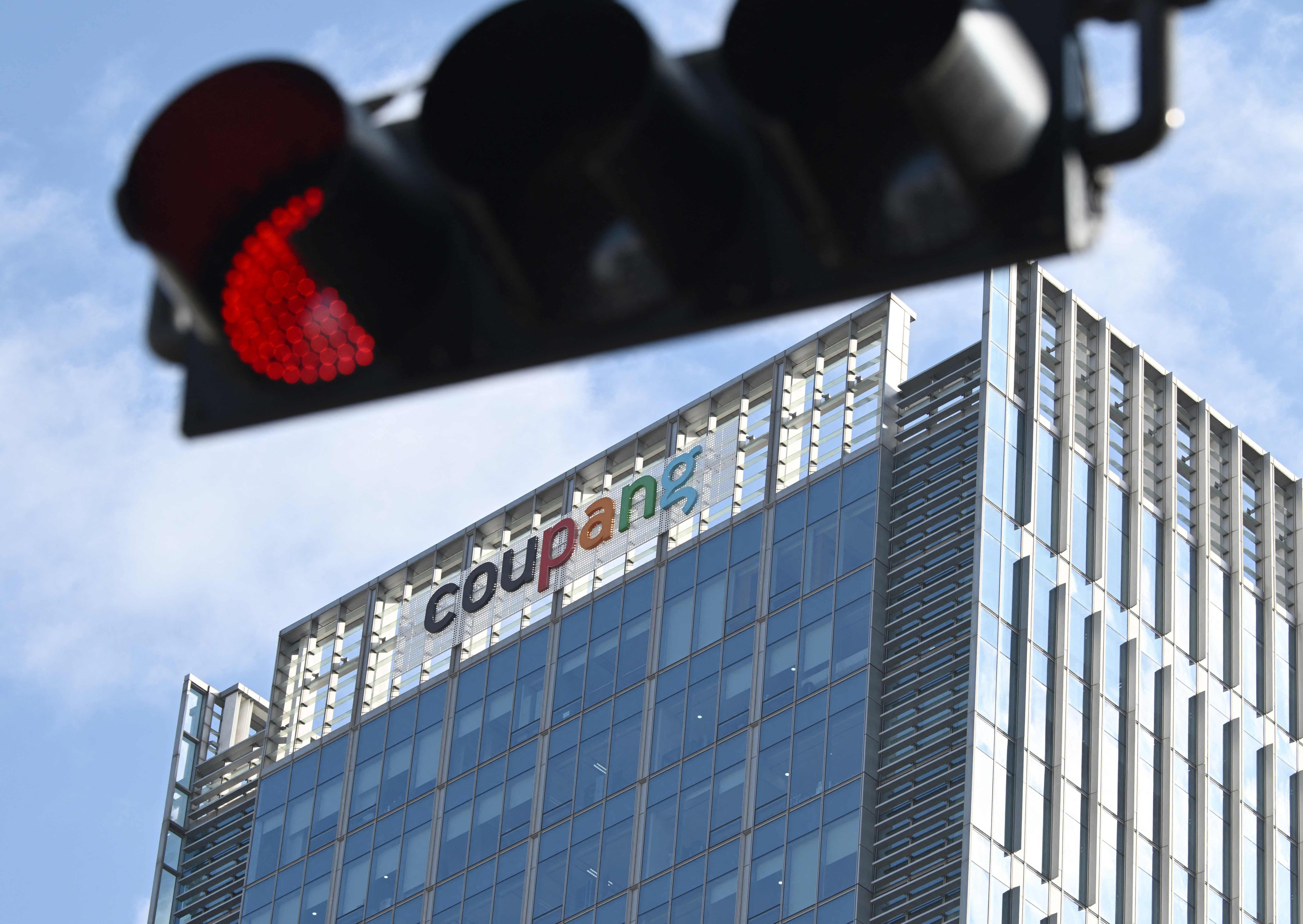 Coupang’s logo can be seen on a building housing the company’s headquarters in Seoul. Photo: AFP