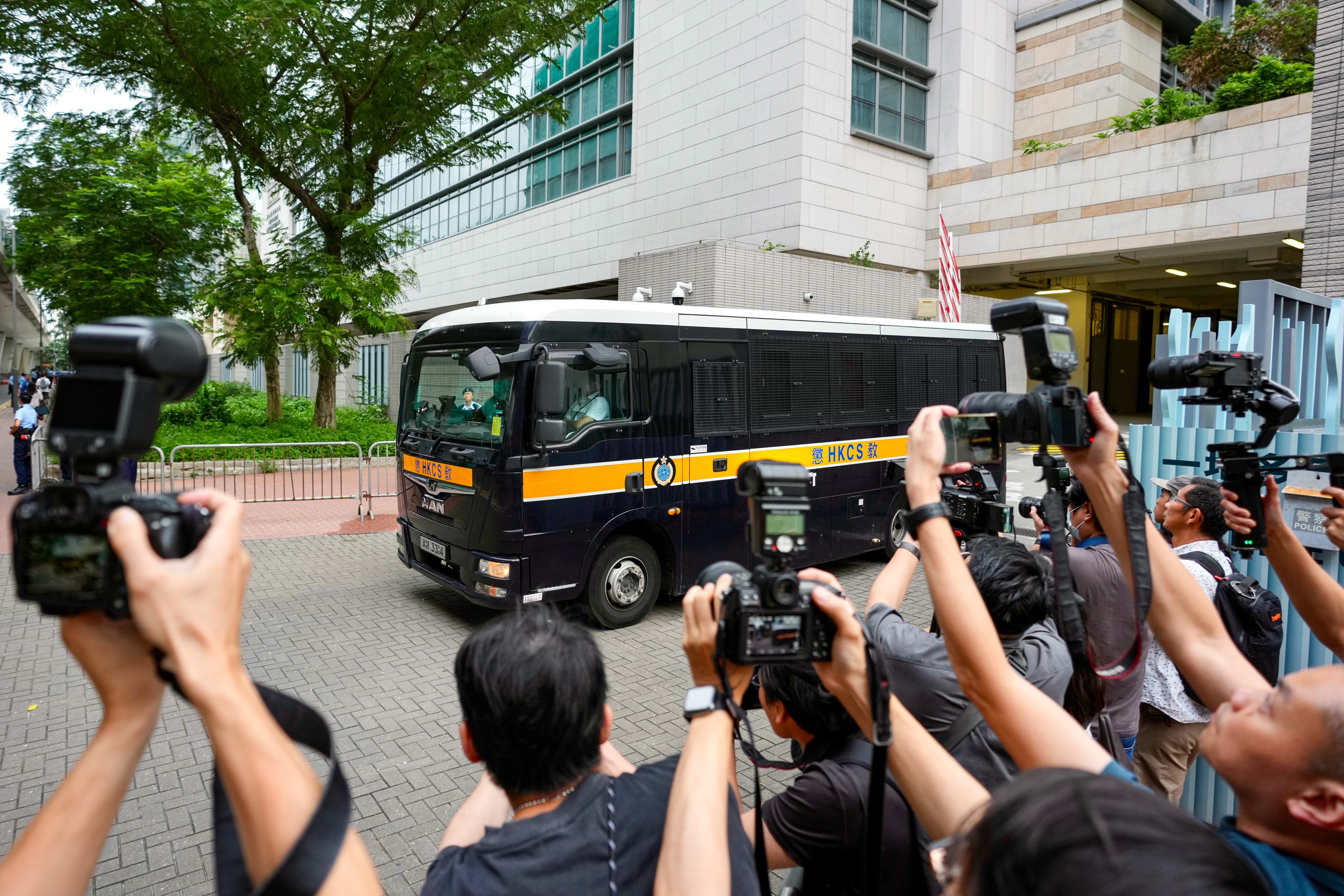 Defendants escorted by the Correctional Services Department leave the West Kowloon Law Courts Building on June 10. Photo: Sam Tsang