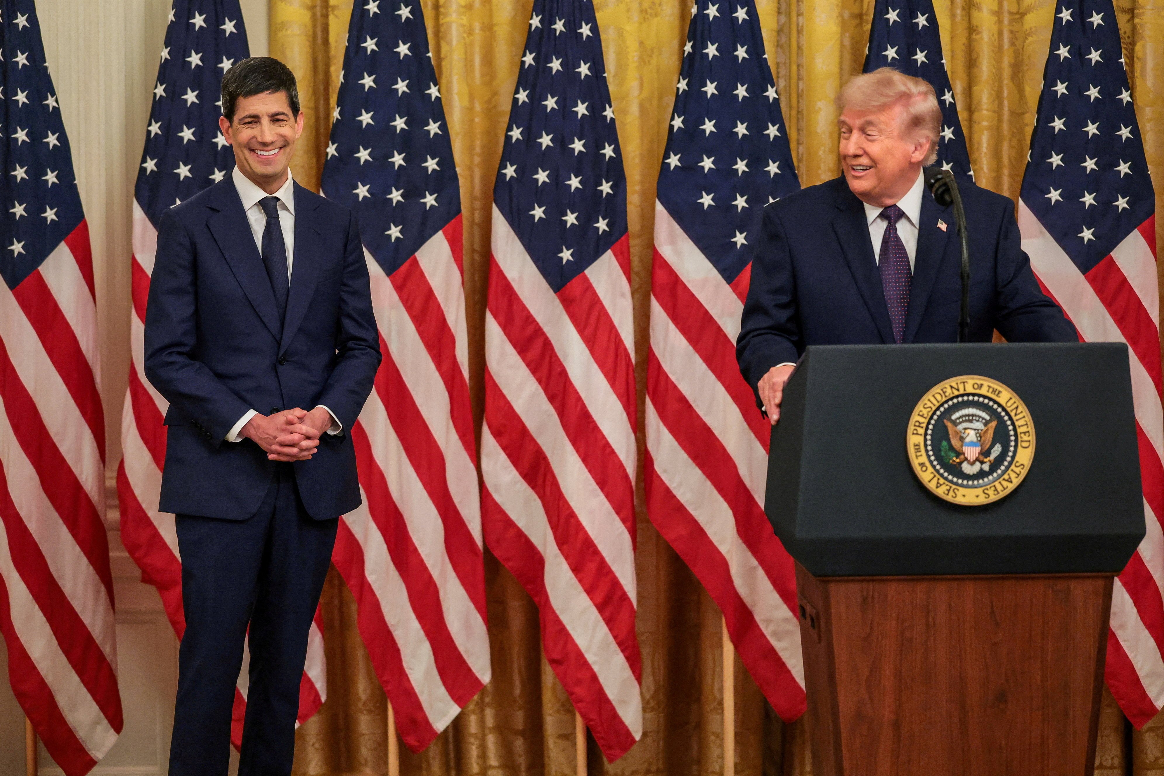 US President Donald Trump (right) enjoys a light moment during the swearing-in ceremony for US Federal Reserve chair Kevin Warsh, in the East Room of the White House in Washington, on May 22. Photo: Reuters