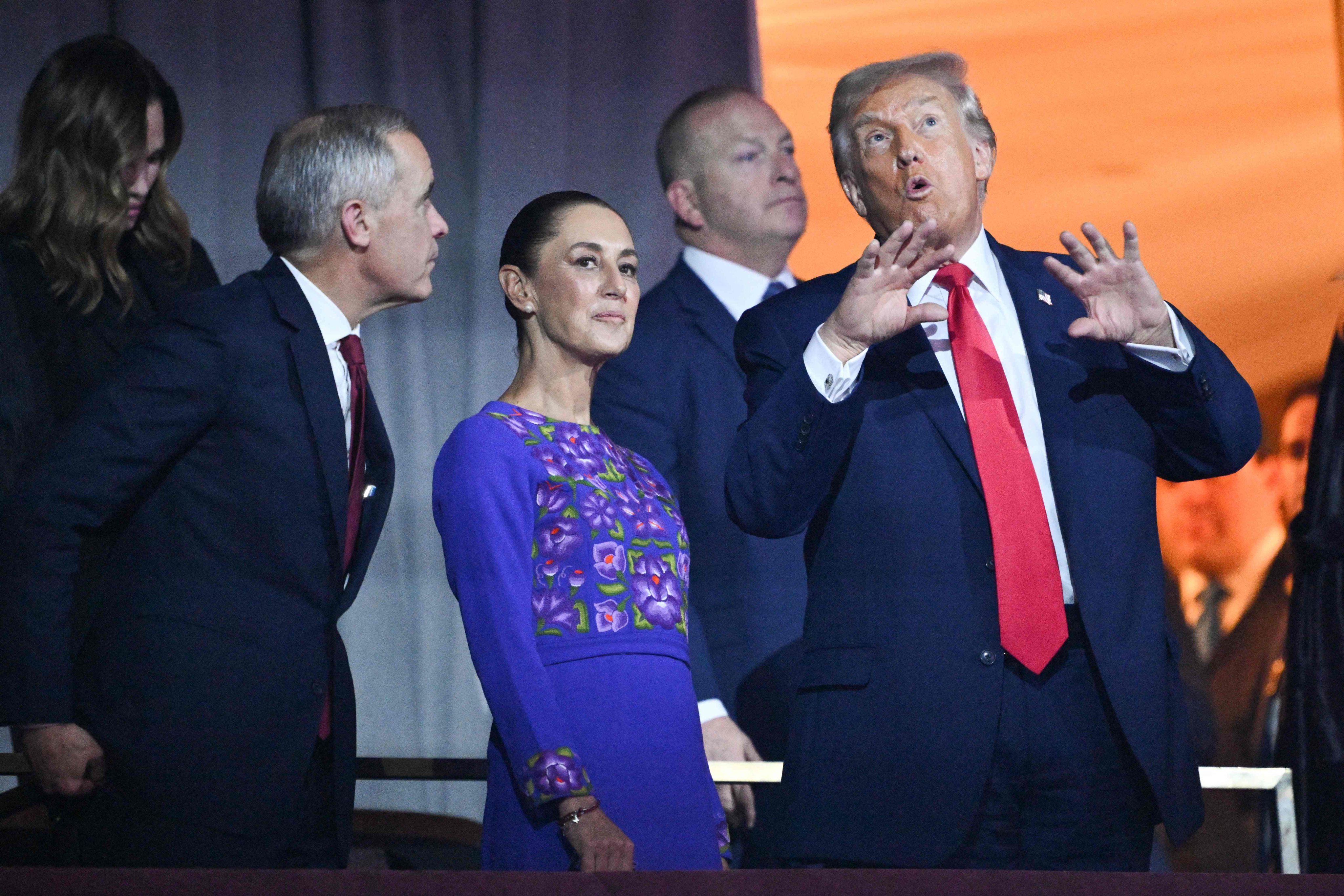 (From left) Canada’s Prime Minister Mark Carney, Mexico’s President Claudia Sheinbaum, and US President Donald Trump speak with each other during an event at the Kennedy Centre in Washington in December. Photo: AFP