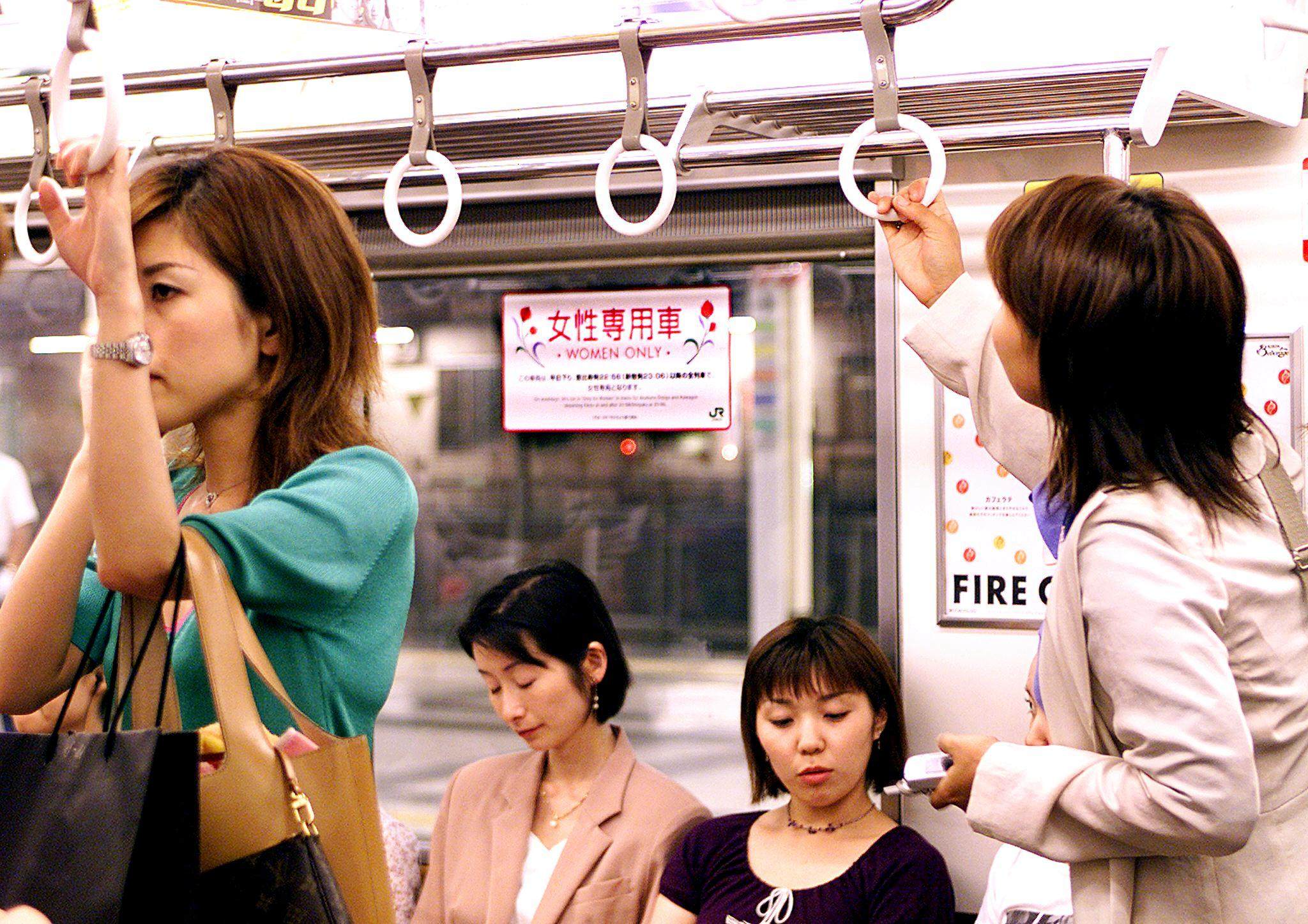 Female passengers wait to leave Tokyo’s Shinjuku station in a women-only carriage late at night in July 2001. Photo: AFP