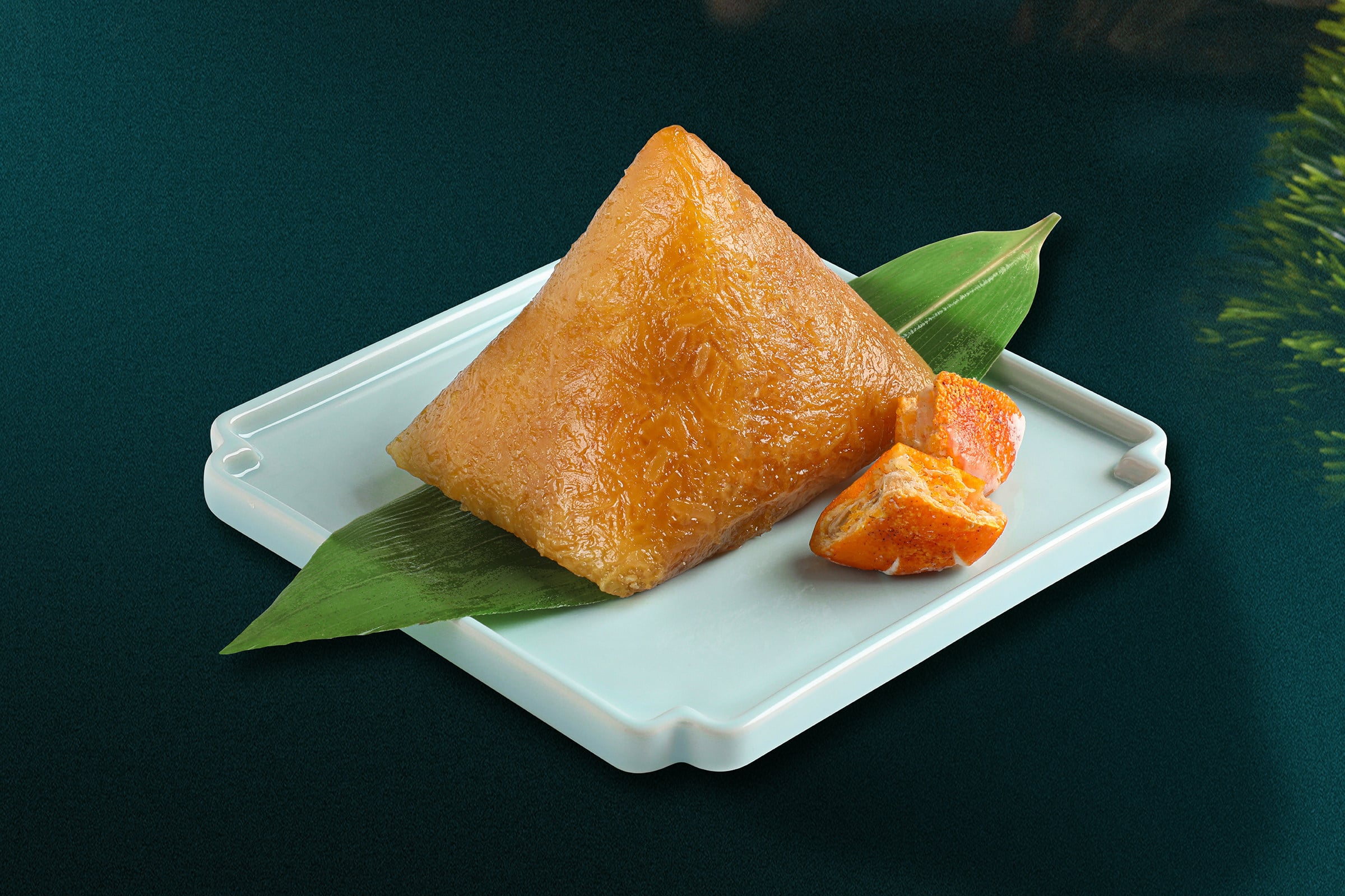 A golden kumquat rice dumpling from Tsui Hang Village in Hong Kong. Alkaline rice dumplings are a Dragon Boat Festival sweet treat with ancient origins. Photo: Tsui Hang Village