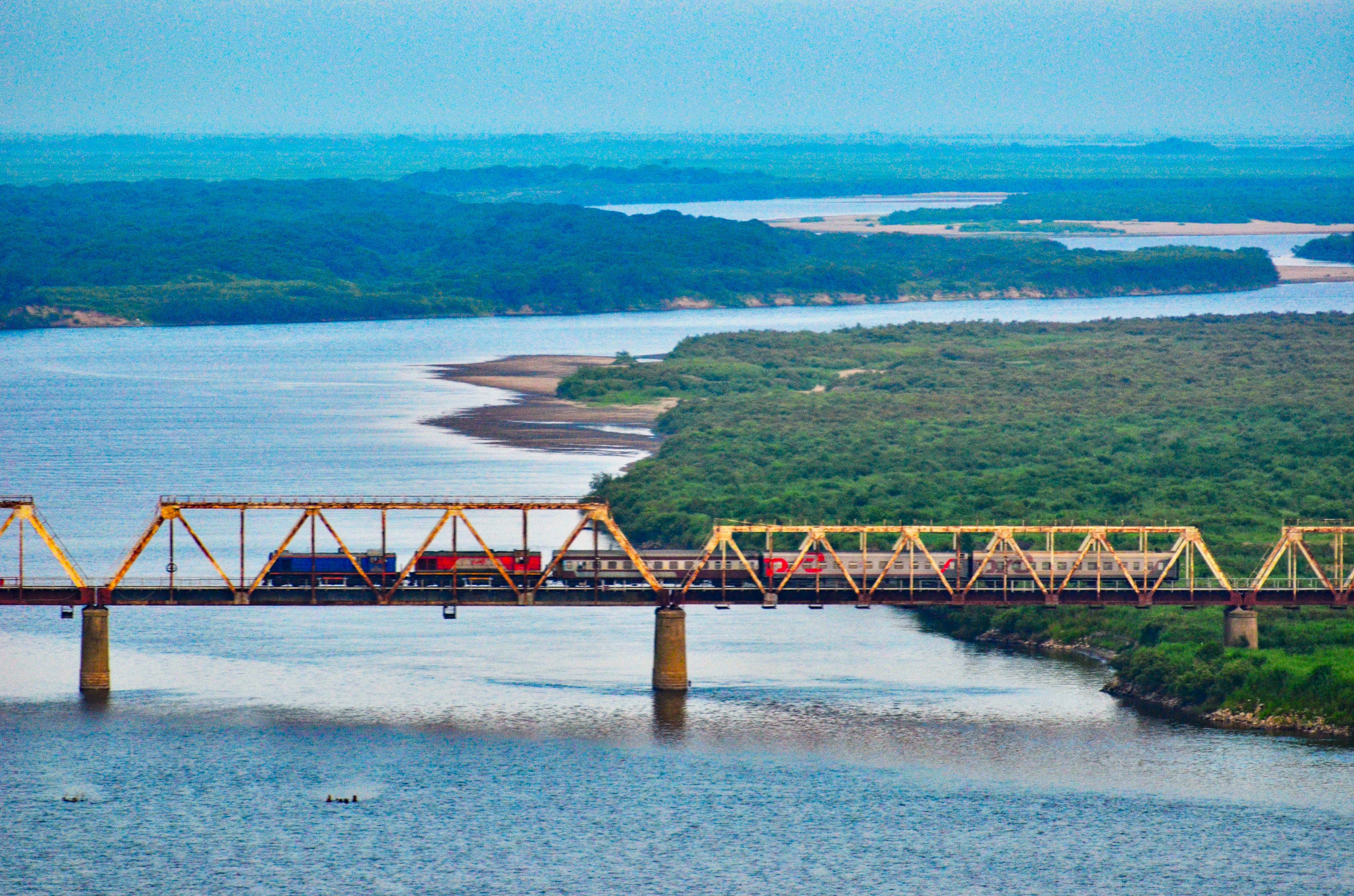 An international passenger train travels on the Korea–Russia Friendship Bridge  across the Tumen River. Photo: Handout