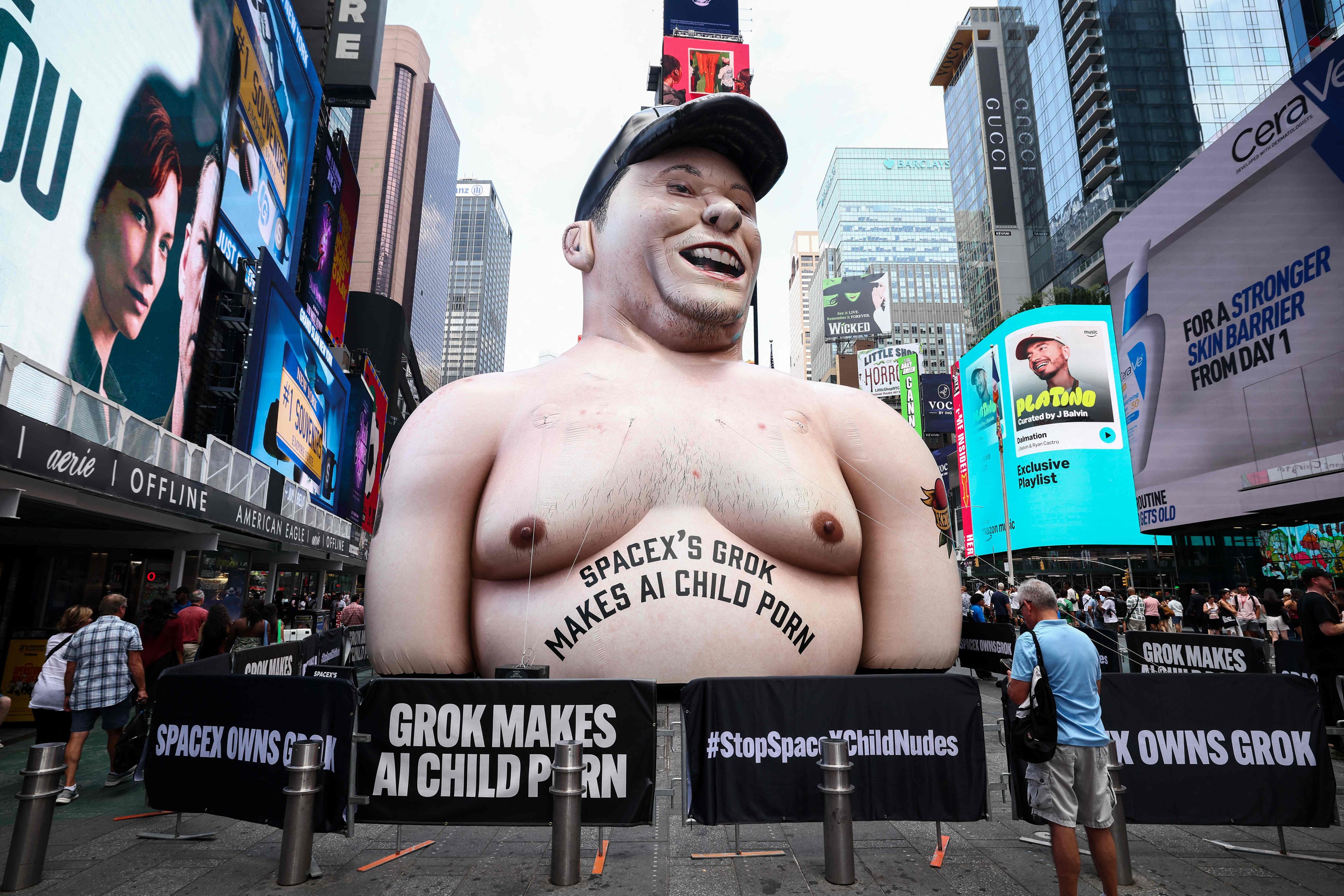 An Elon Musk inflatable stands in New York’s Times Square on Thursday as part of a protest against SpaceX’s Grok AI. Photo: AFP