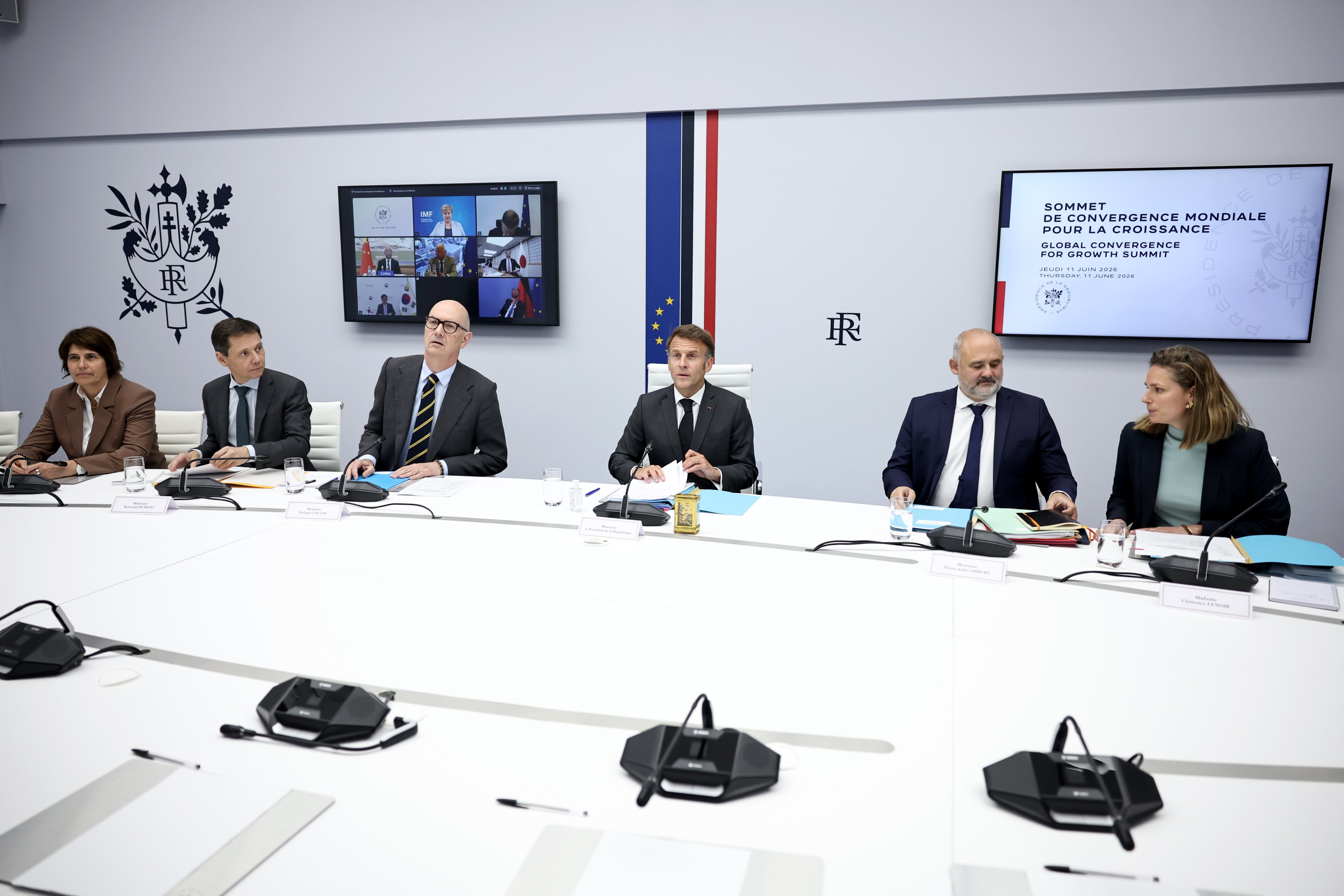 French President Emmanuel Macron (centre) chairs an international videoconference on global growth. Photo: EPA