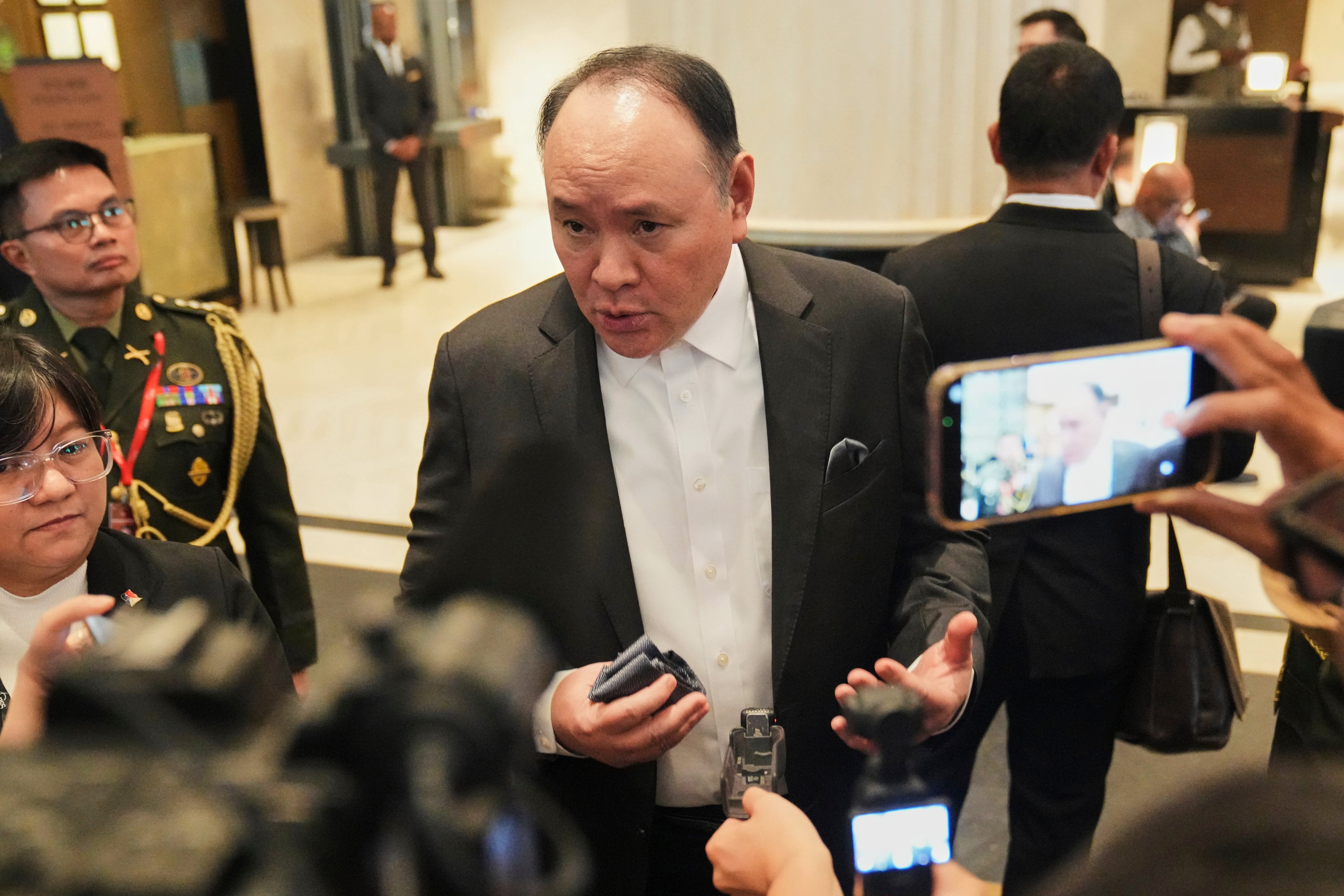 Philippine Defence Secretary Gilberto Teodoro talks to the media as he attends the Shangri-La Dialogue in Singapore on May 29. Photo: AP