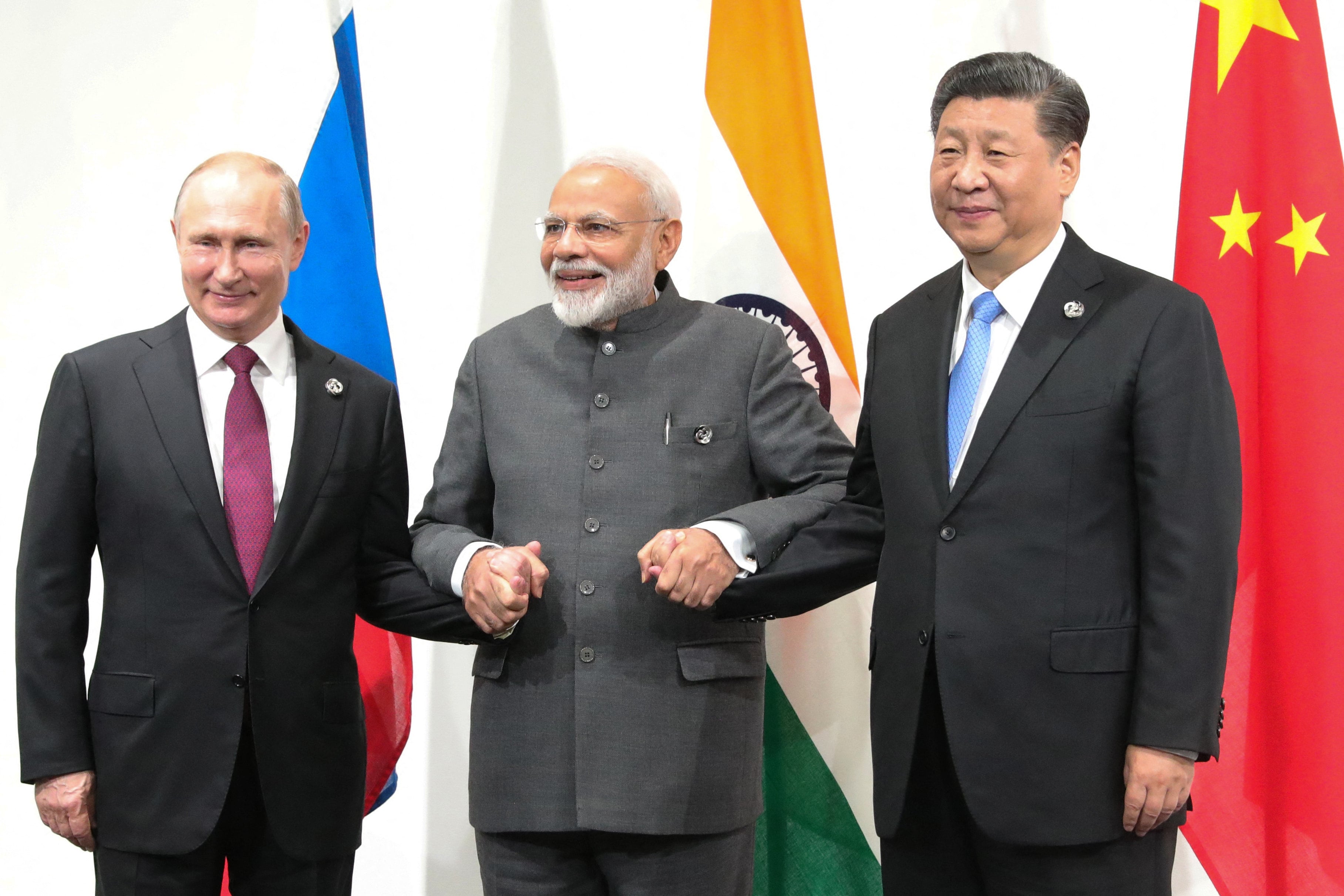 (From left to right) Russian President Vladimir Putin, Indian Prime Minister Narendra Modi and Chinese President Xi Jinping hold a meeting on the sidelines of the G20 summit in Osaka, Japan, on June 28, 2019. Photo: SPUTNIK / AFP