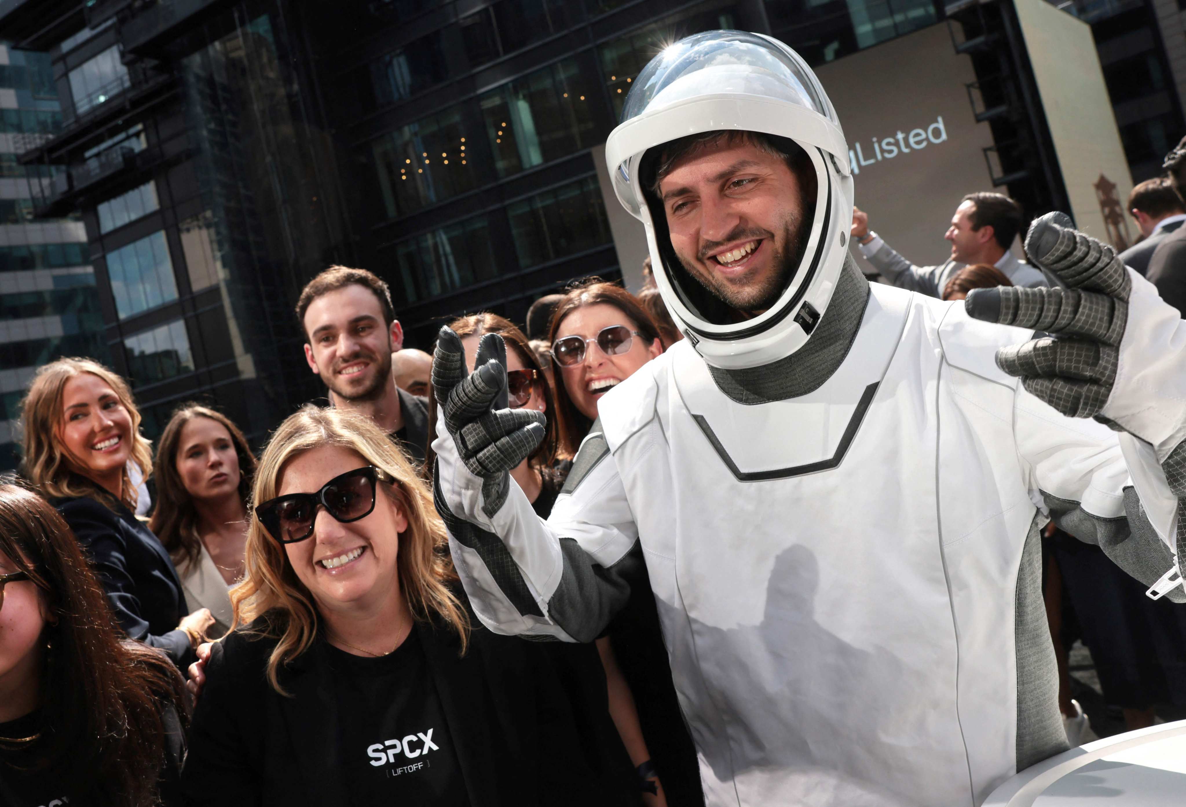 SpaceX employees celebrate the firm’s record-breaking IPO in New York. Photo: AFP