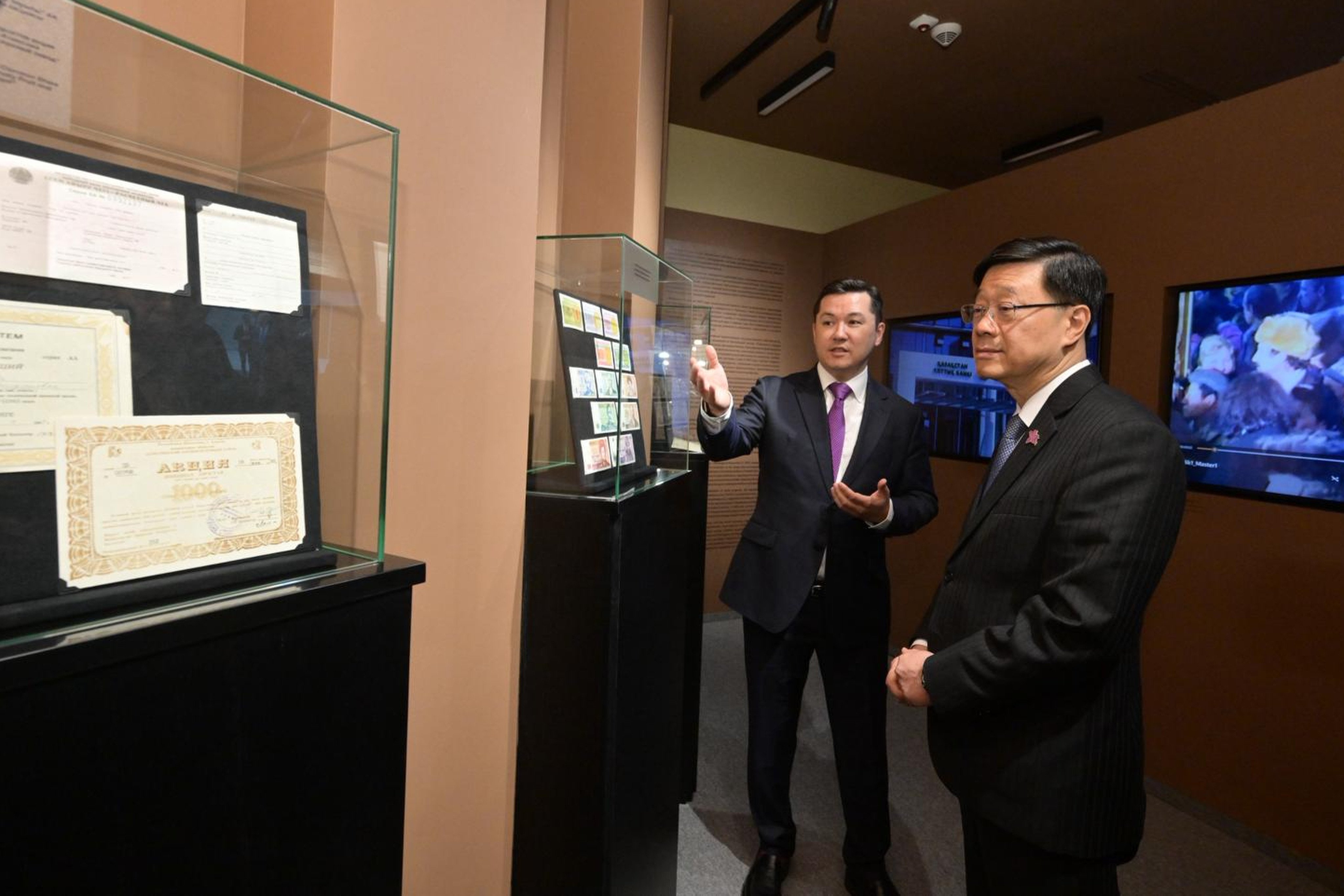 Governor Renat Bekturov (left) shows Chief Executive John Lee around the Astana International Financial Centre. Photo: Handout