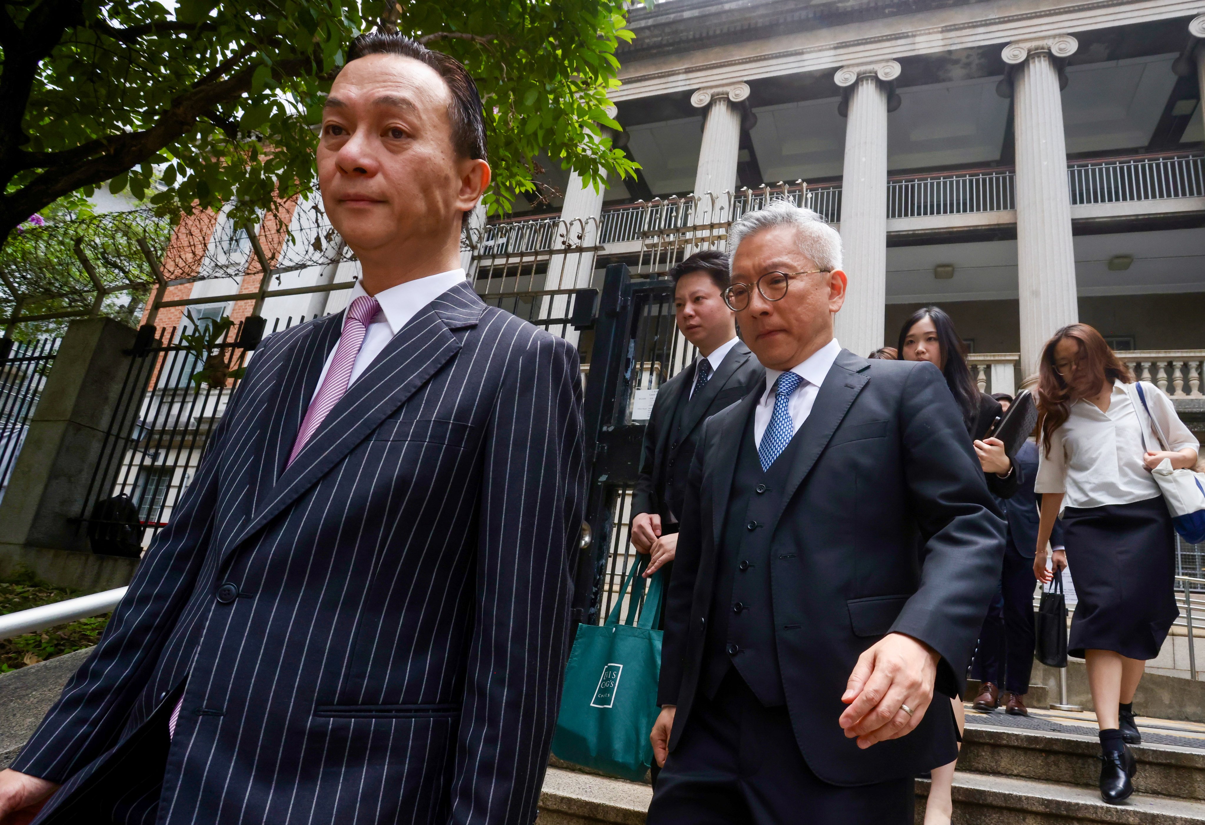 Hectar Pun Hei SC (left) representing Hop On Management, at the Lands Tribunal in Yau Ma Tei on June 1. Photo: Jonathan Wong