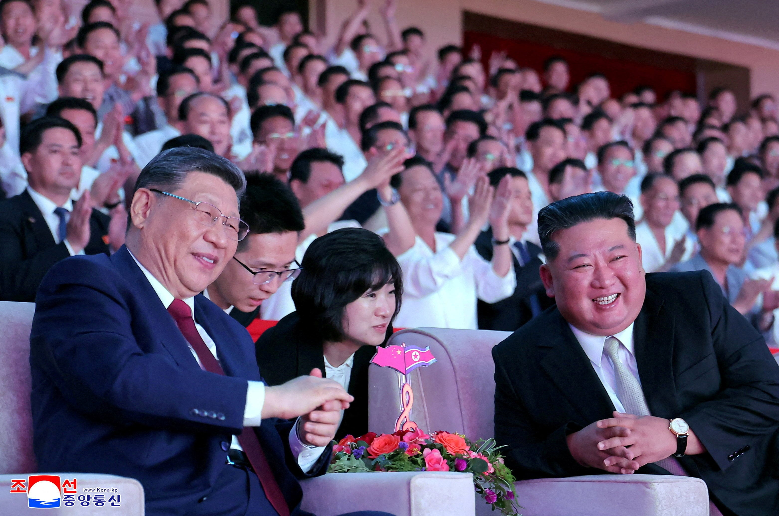 Kim Jong-un and Xi Jinping watch a performance in Pyongyang during the Chinese leader’s visit. Photo: Reuters