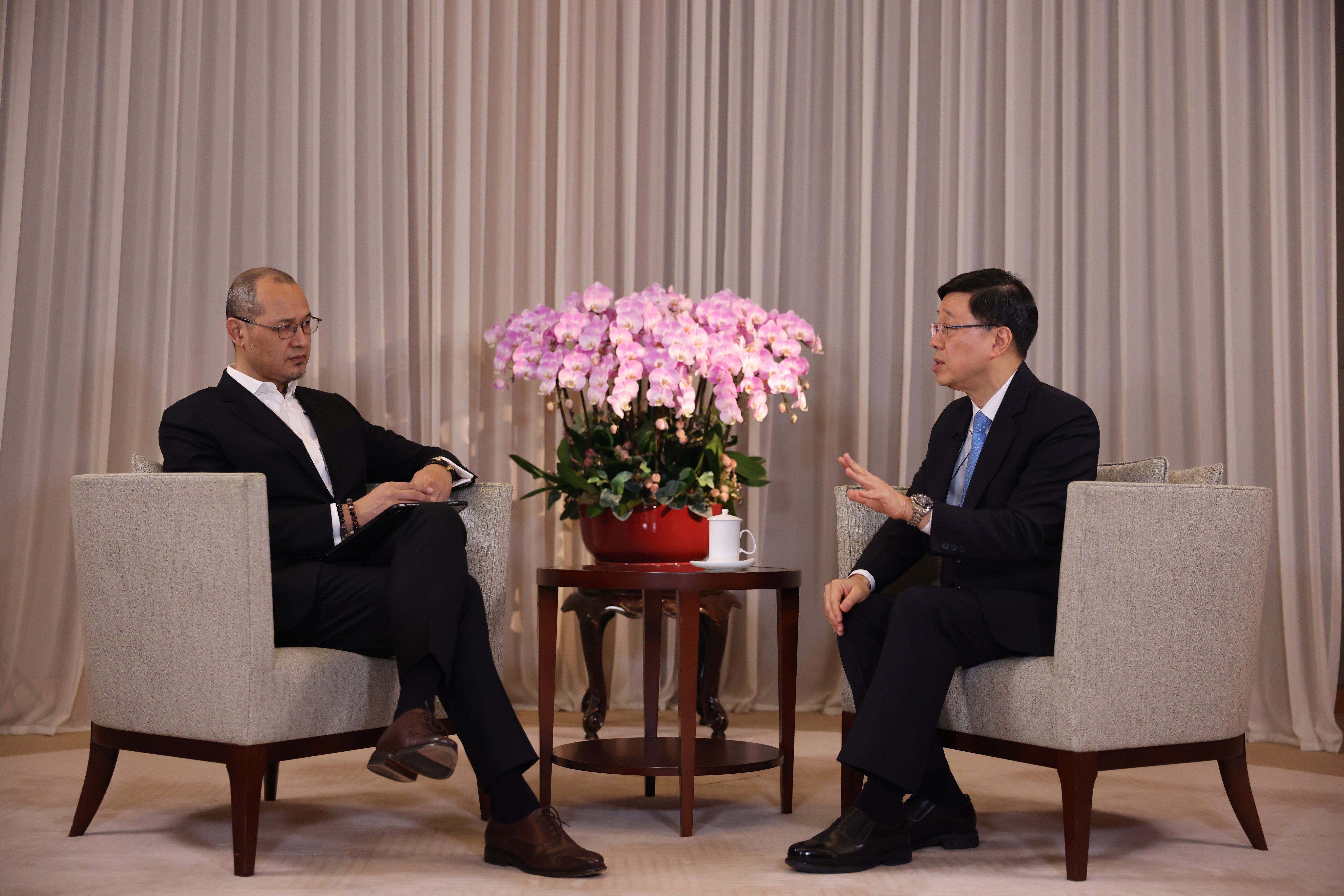 Chief Executive John Lee (right) sits down for an interview with SCMP managing editor Yonden Lhatoo. Photo: Nora Tam
