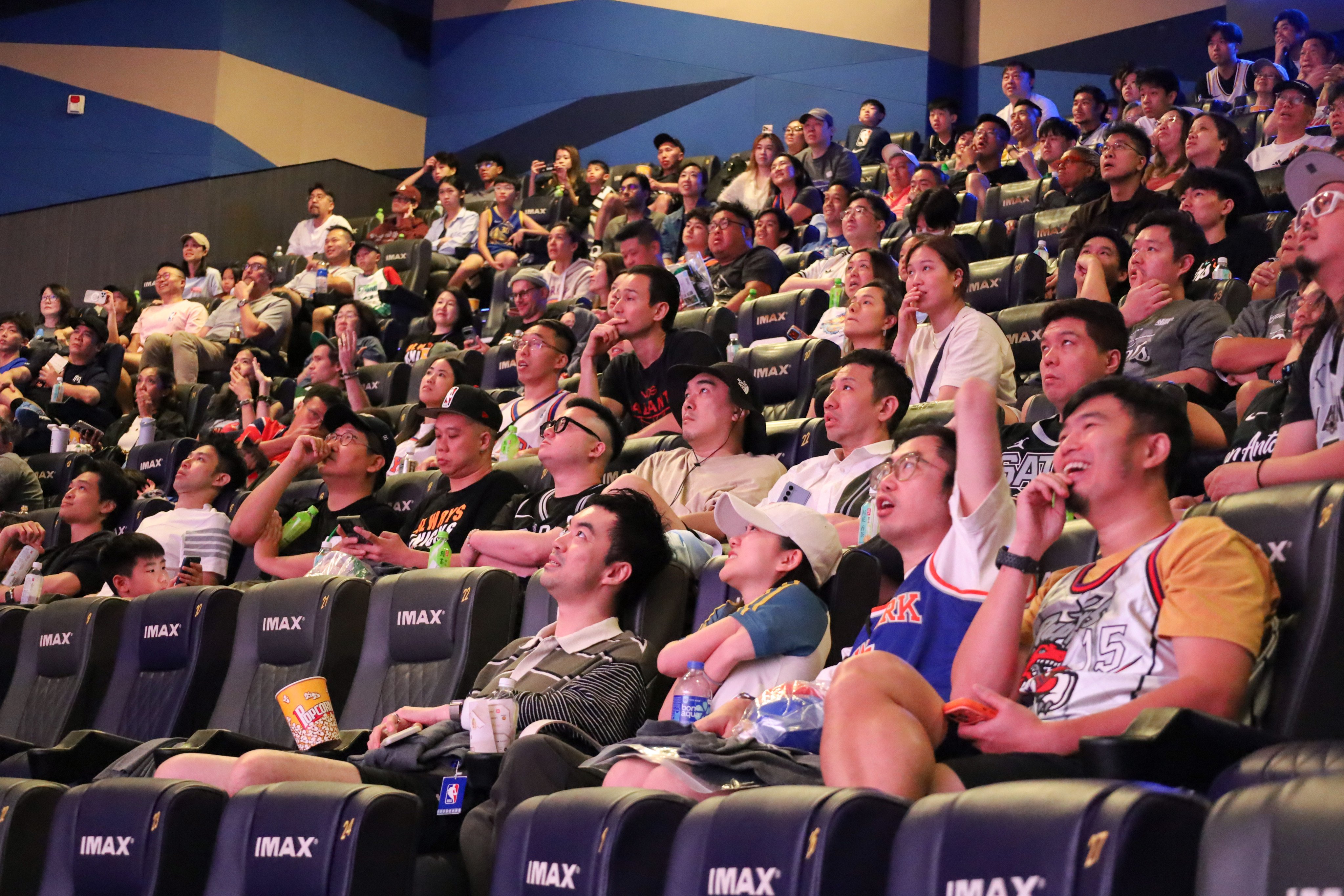 Hundreds of Hong Kong basketball fans gathered at a cinema at Megabox in Kowloon Bay on Sunday to watch the NBA final. Photo: Wynna Wong