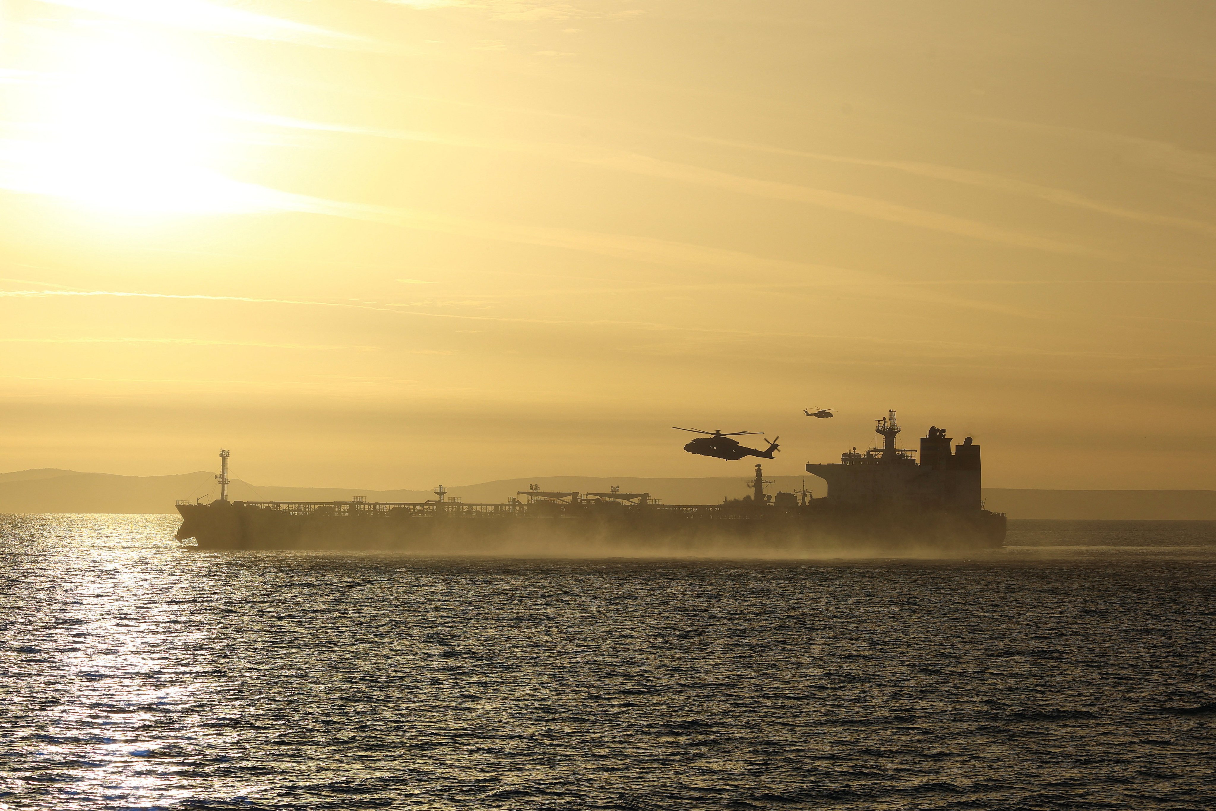 UK Royal Marine Commandos board the ship Smyrtos off the south coast of England, on Sunday. Photo: Reuters