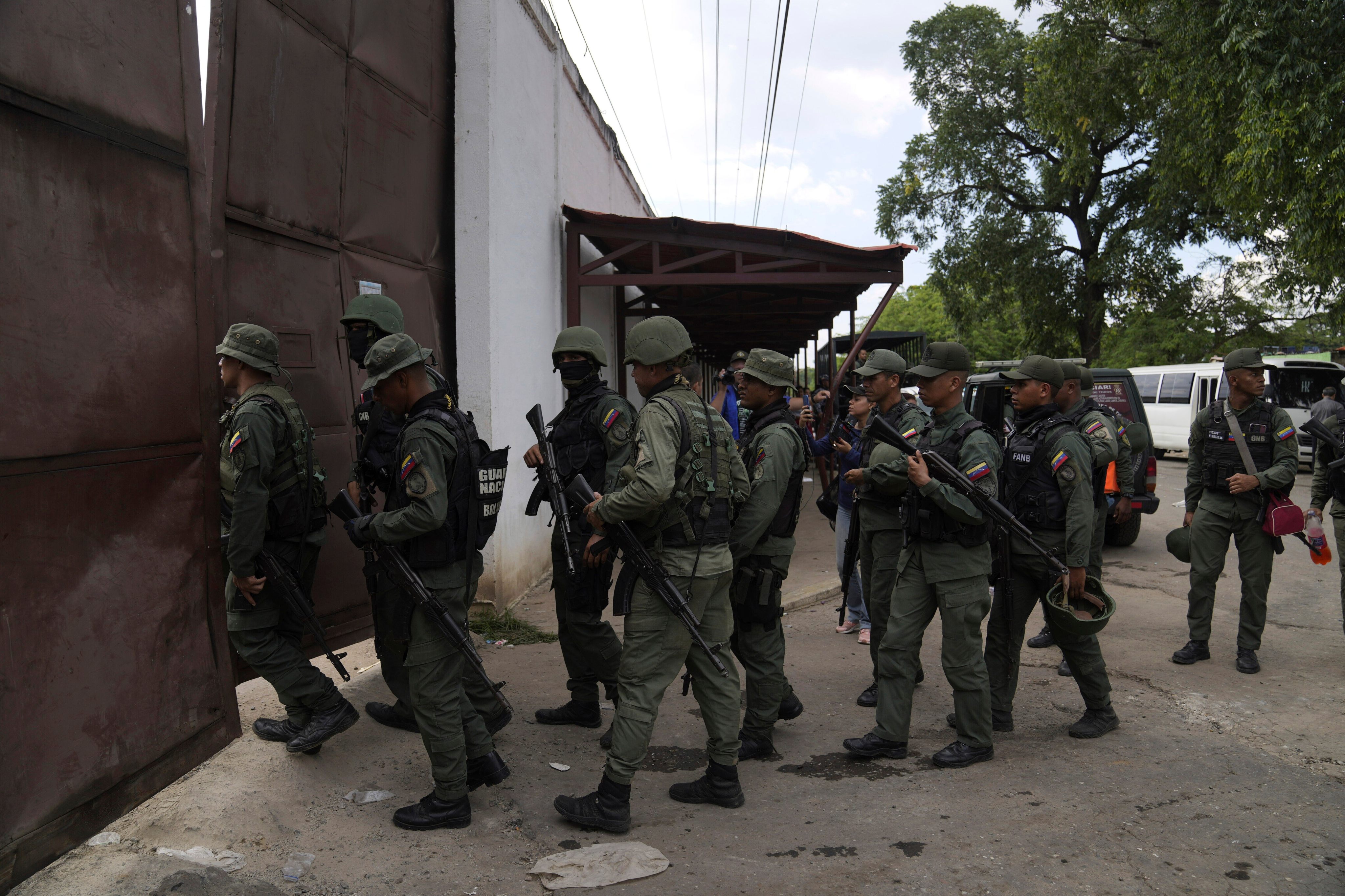 Soldiers raid the Tocoron Penitentiary Centre, where the Tren de Aragua gang originated, in Venezuela in September 2023. Photo: AP